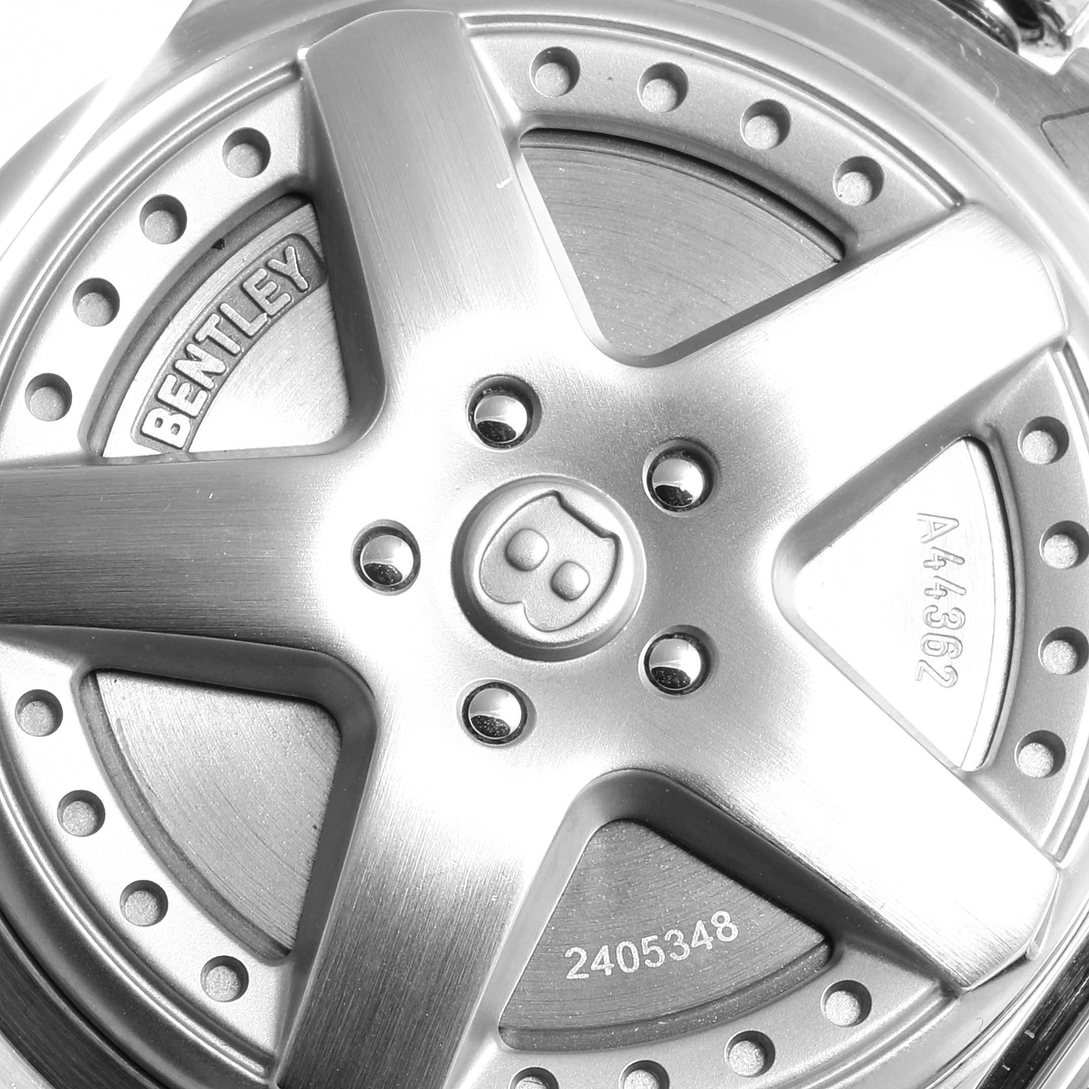 The image shows a close-up of the back cover of a Breitling Bentley A44362 Men's Stainless Steel Black Dial A44362 Men's Stainless Steel Black Dial model watch, displaying its intricate design and engravings.