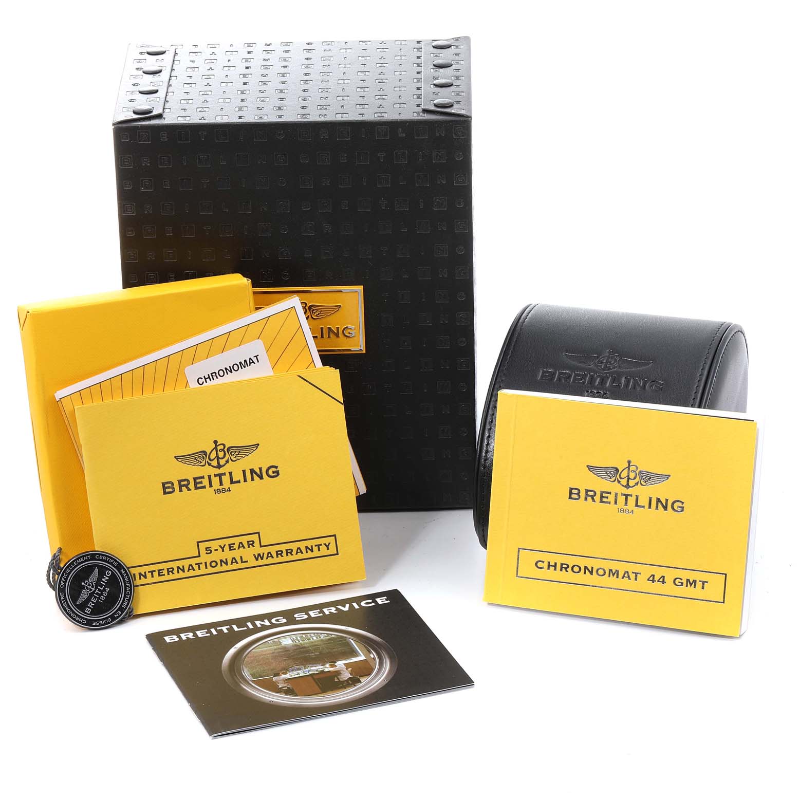 The image shows boxes, manuals, warranty cards, and a watch case for the Breitling Chronomat AB042011/C851-375A Men
s Stainless Steel Blue Dial AB042011/C851-375A Men
s Stainless Steel Blue Dial model.
