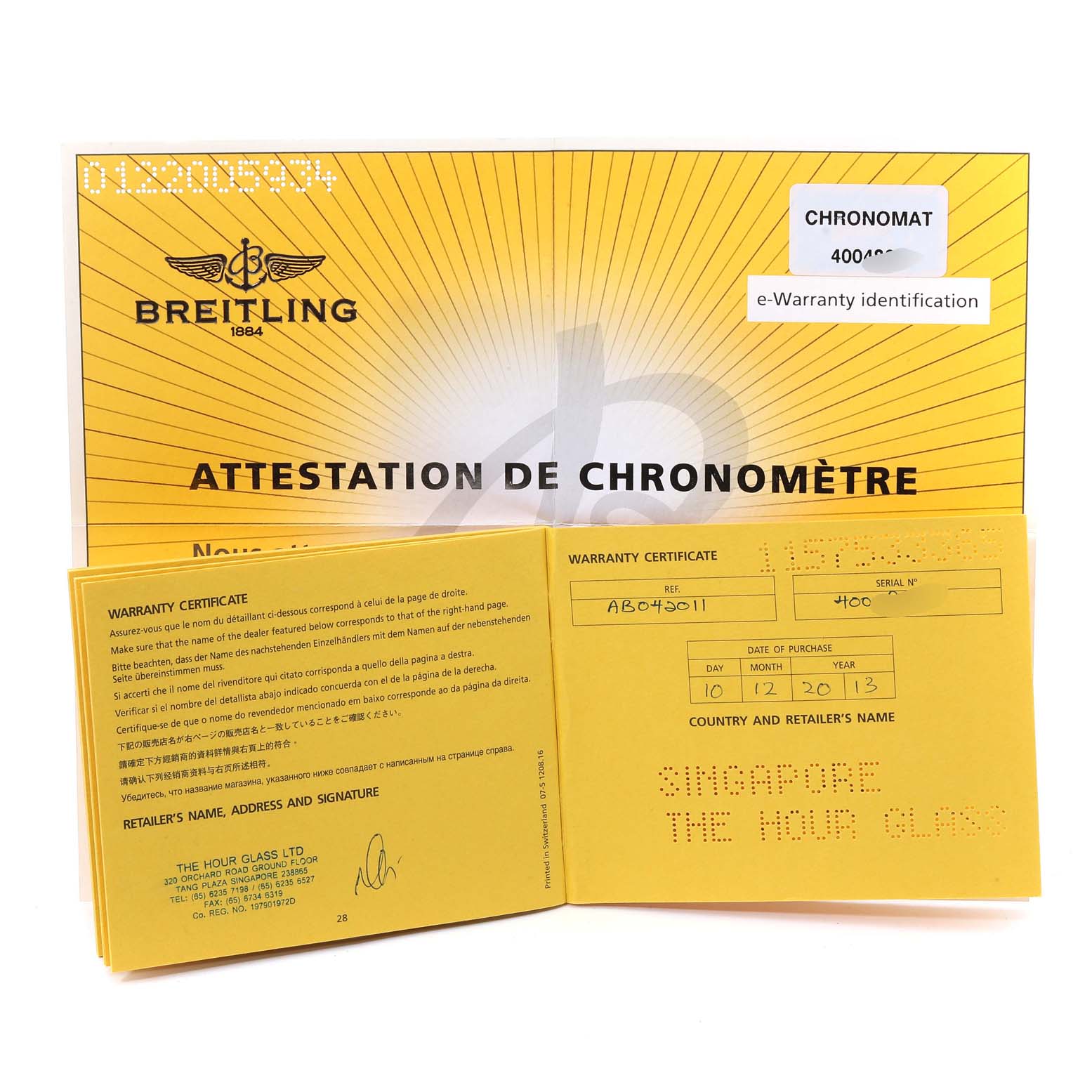 The image shows the warranty certificate and e-Warranty identification card for the Breitling Chronomat AB042011/C851-375A Men
s Stainless Steel Blue Dial AB042011/C851-375A Men
s Stainless Steel Blue Dial watch.