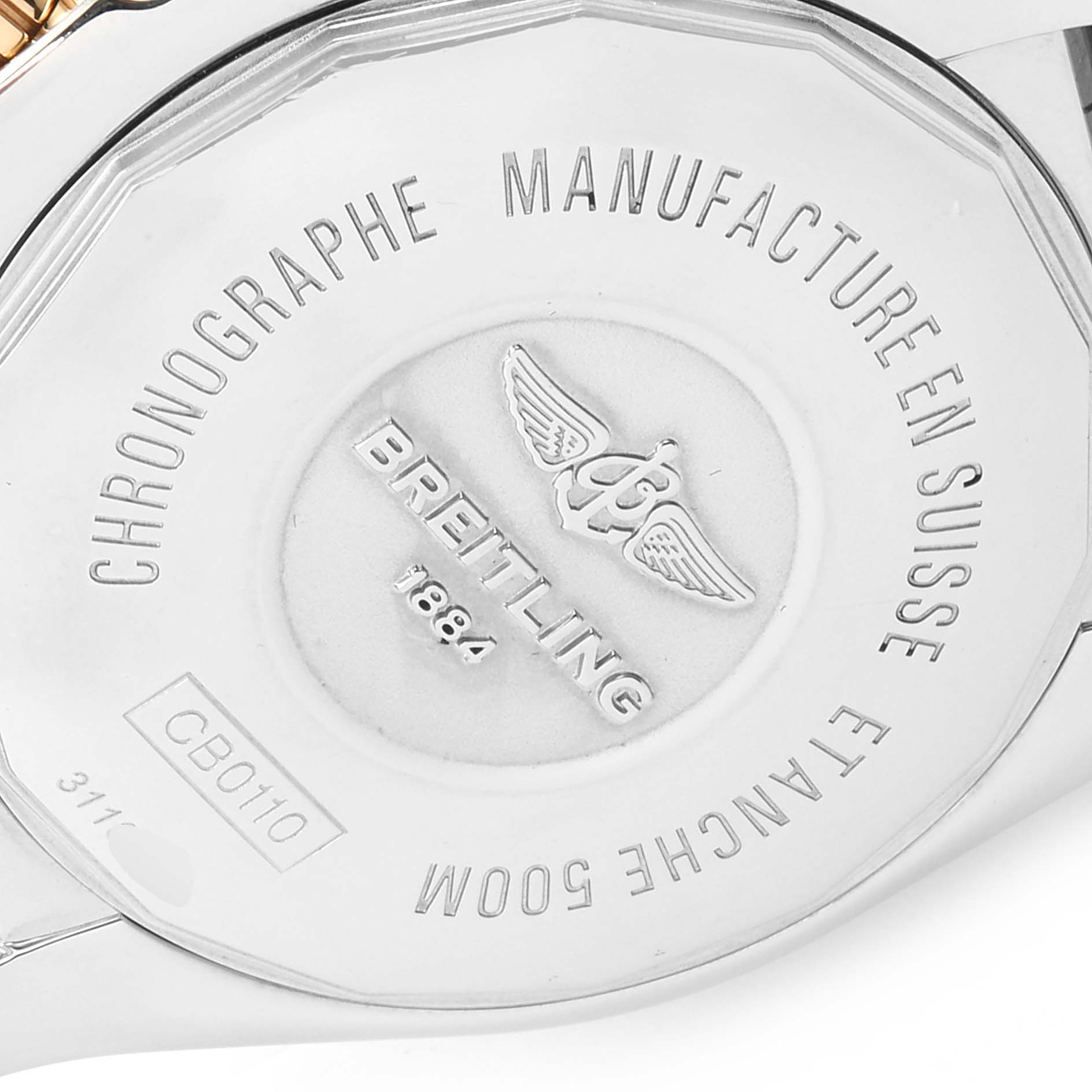 The image shows the back case of a Breitling Chronomat CB011012/C790 Men
s Steel and Gold (two tone) Black Dial CB011012/C790 Men
s Steel and Gold (two tone) Black Dial watch, displaying the brand name, logo, and model details.