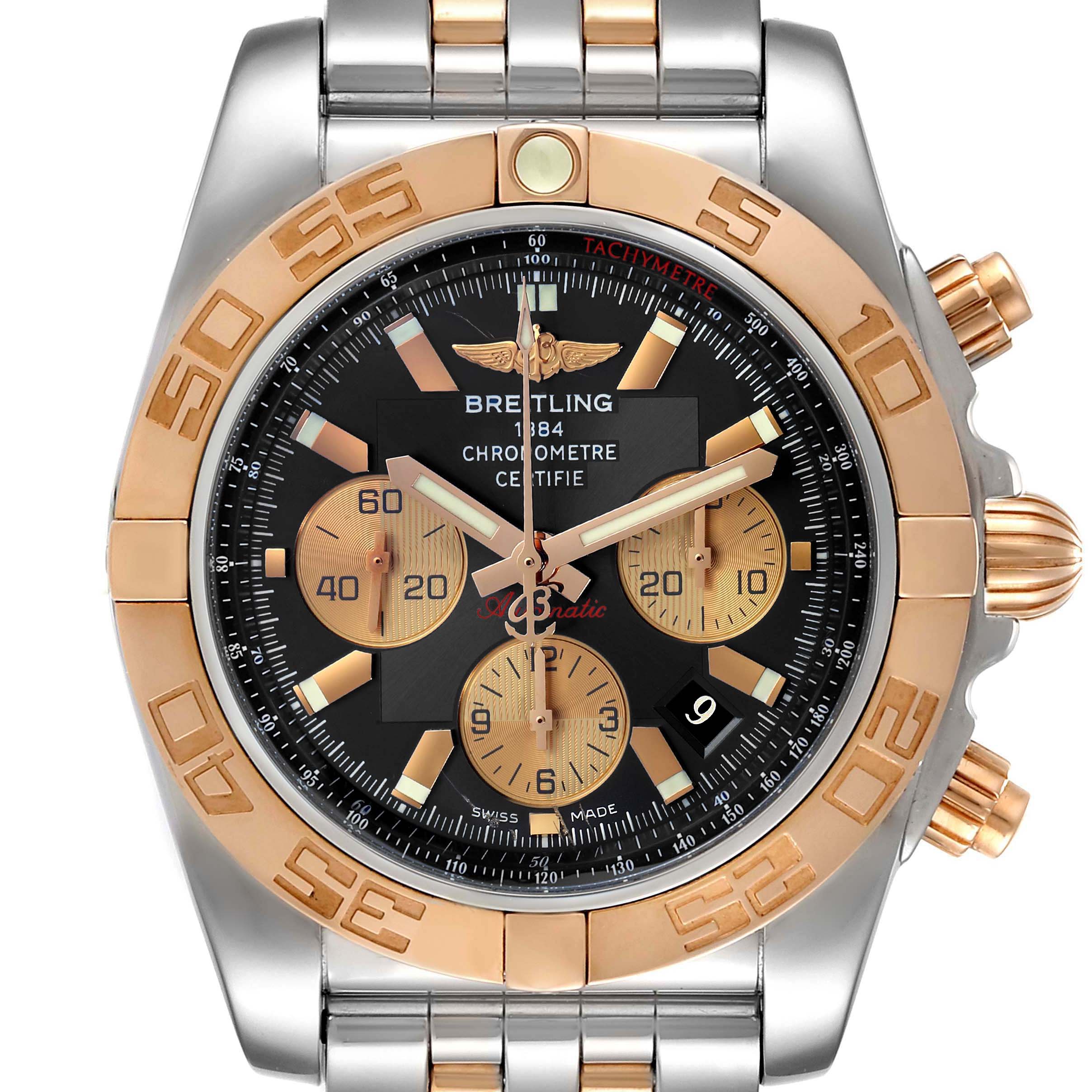 The image shows a front view of a Breitling Chronomat CB011012/C790 Men
s Steel and Gold (two tone) Black Dial CB011012/C790 Men
s Steel and Gold (two tone) Black Dial watch, highlighting its face, bezel, and part of the bracelet.