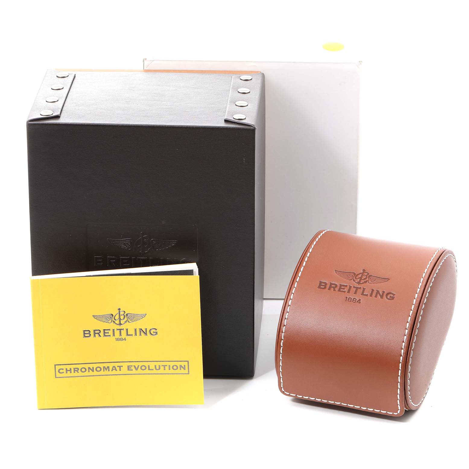 The image shows the box, leather watch case, and instruction manual for the Breitling Chronomat CB011012/C790 Men
s Steel and Gold (two tone) Black Dial CB011012/C790 Men
s Steel and Gold (two tone) Black Dial Evolution.