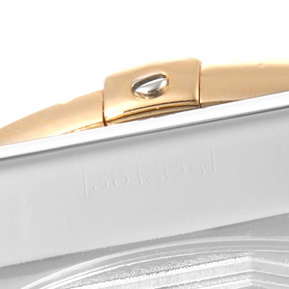 The image shows a close-up angle of the side of a Breitling Chronomat CB011012/C790 Men
s Steel and Gold (two tone) Black Dial CB011012/C790 Men
s Steel and Gold (two tone) Black Dial watch, focusing on the bracelet and a screw.