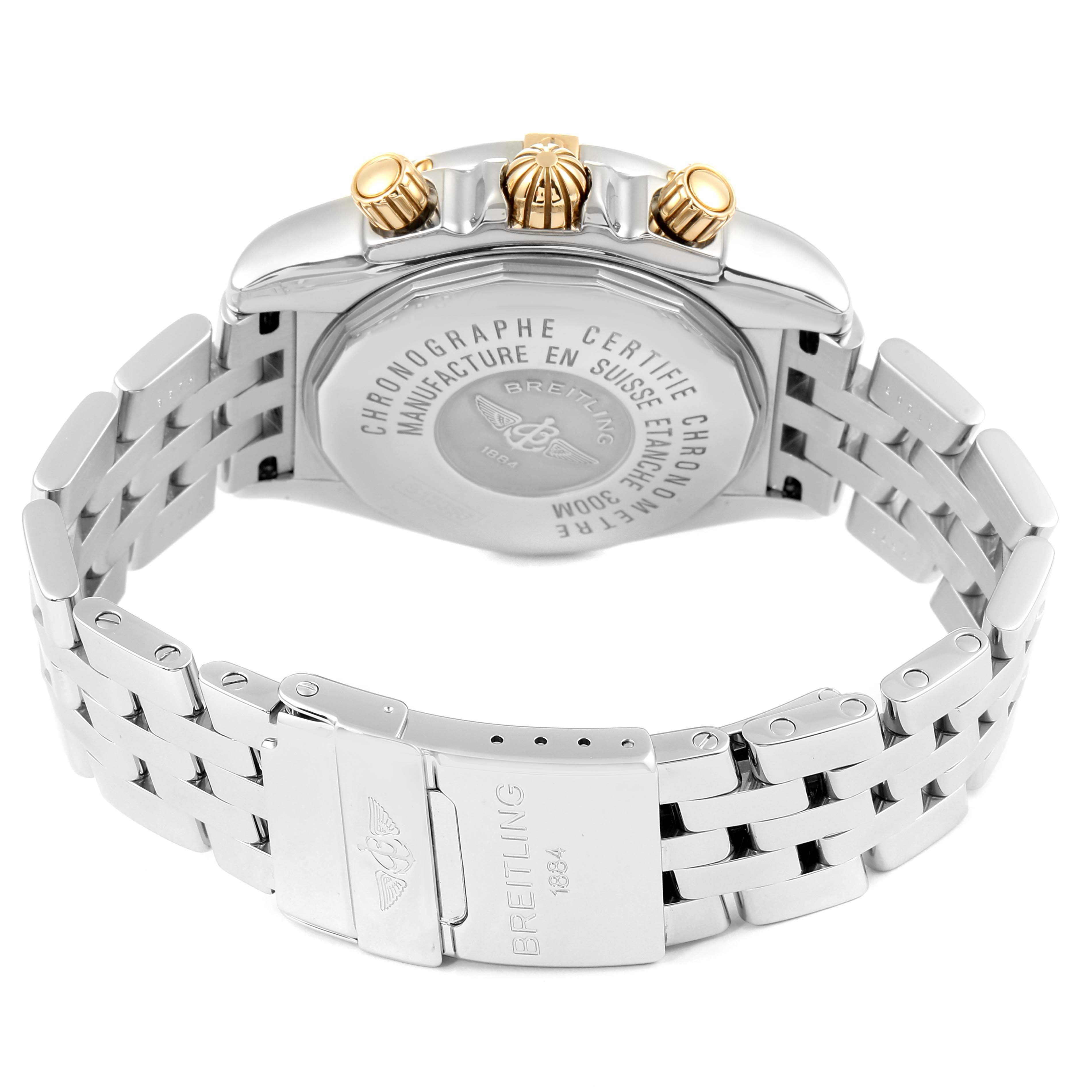 This image shows the back and bracelet of a Breitling Chronomat B13356 Men's Steel and Gold (two tone) Silver Dial B13356 Men's Steel and Gold (two tone) Silver Dial watch, highlighting its clasp and crown.