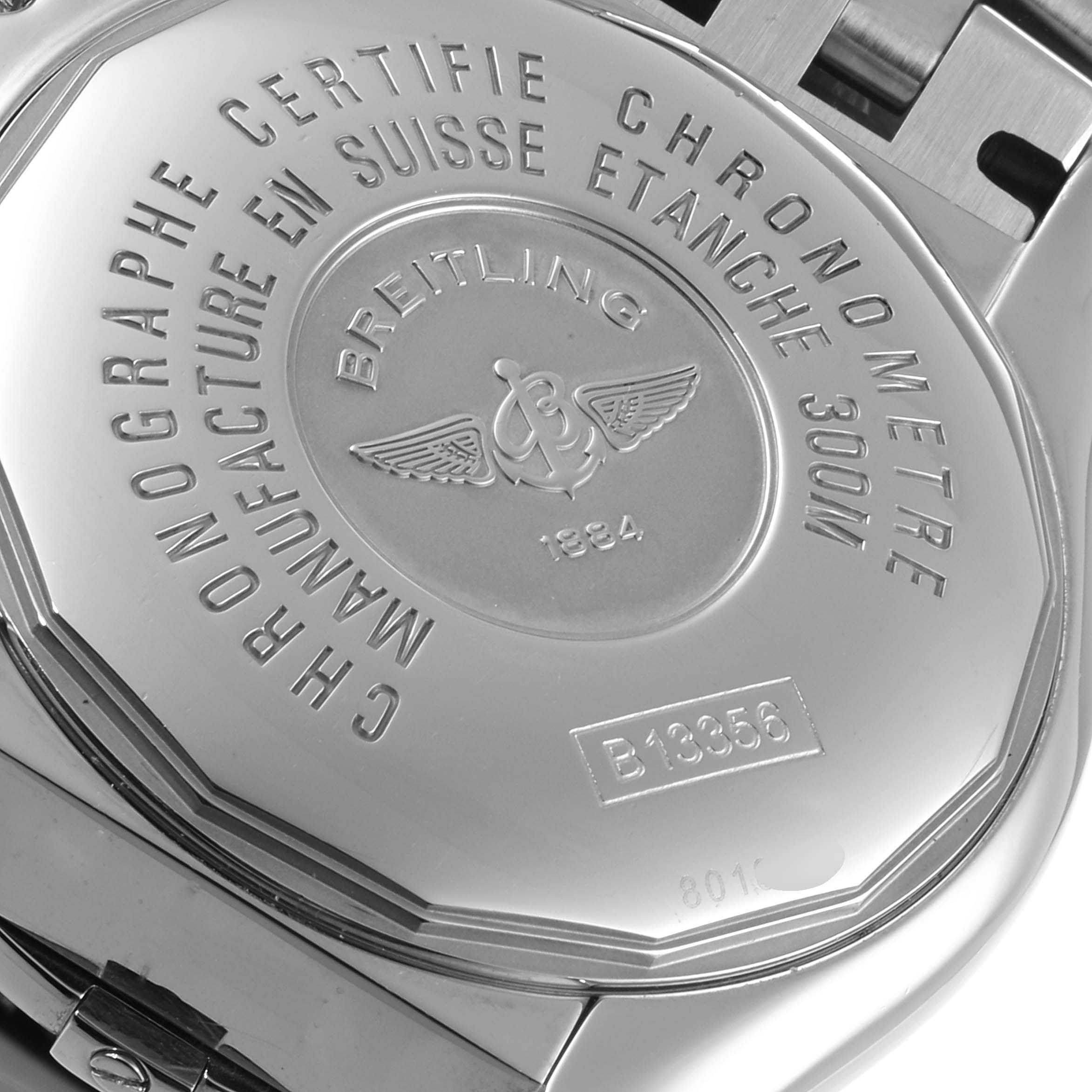 This image shows the back case of a Breitling Chronomat B13356 Men's Steel and Gold (two tone) Silver Dial B13356 Men's Steel and Gold (two tone) Silver Dial watch.