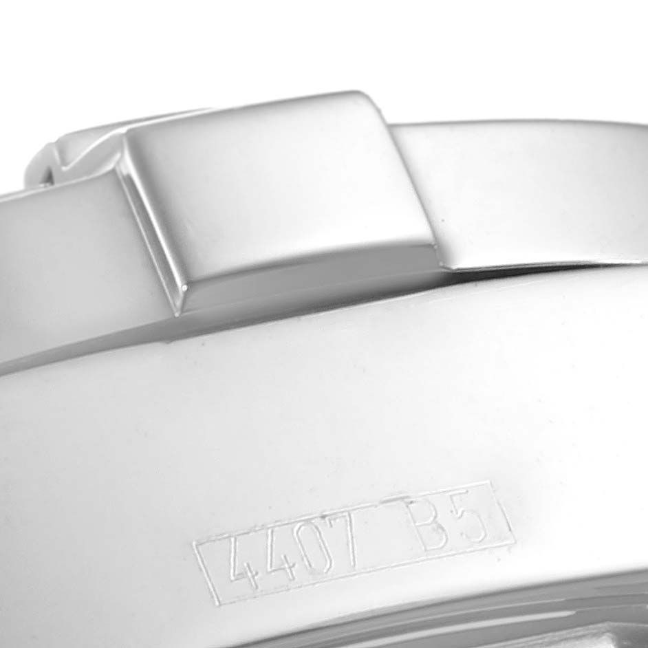 This image shows a close-up of the side and part of the clasp from a Breitling Colt A32350 Men's Stainless Steel Blue Dial A32350 Men's Stainless Steel Blue Dial watch.