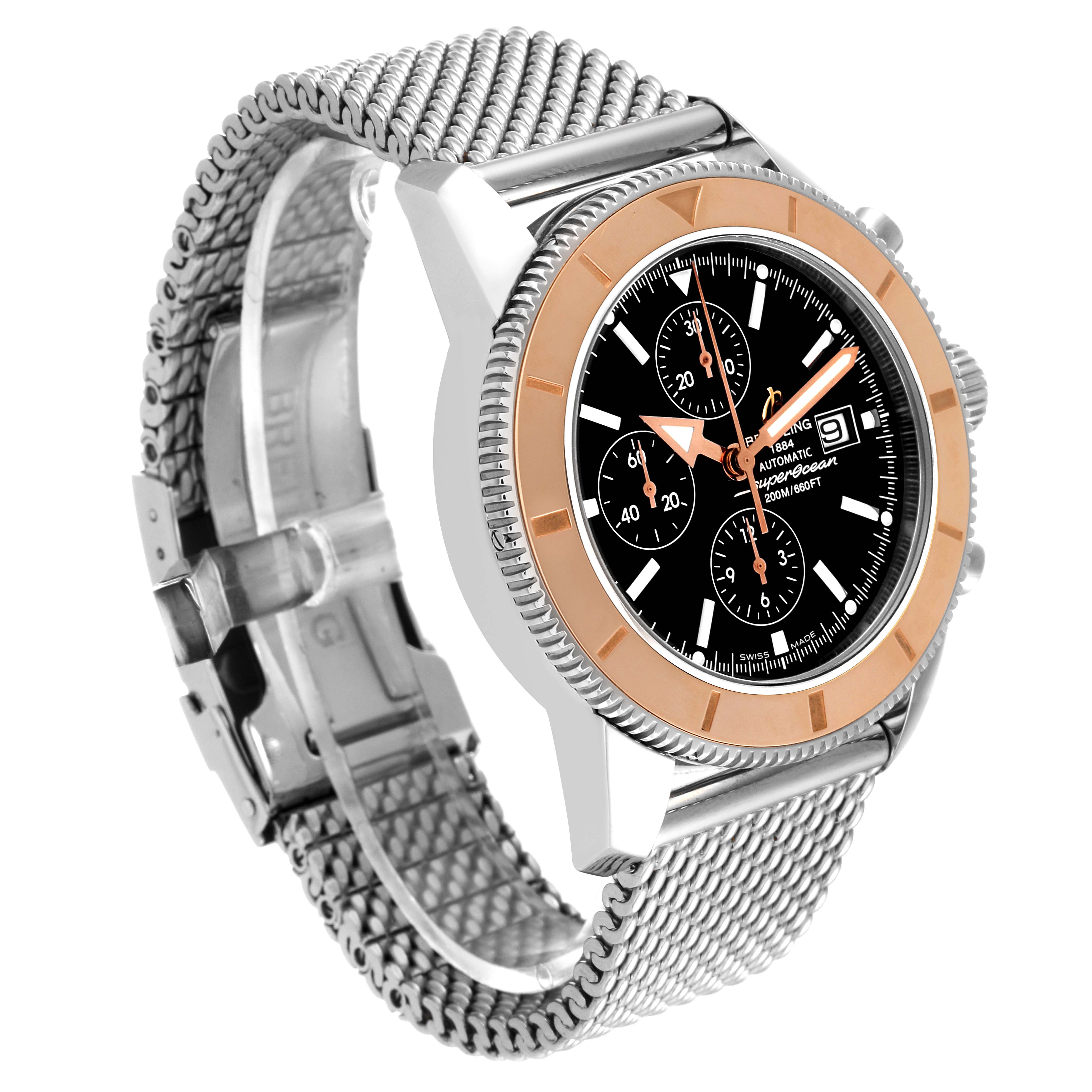 The image shows a Breitling Superocean U1332012/B908-152A Men's Steel and Gold (two tone) Black Dial U1332012/B908-152A Men's Steel and Gold (two tone) Black Dial watch at a three-quarter angle, highlighting its face, bezel, and mesh metal bracelet.