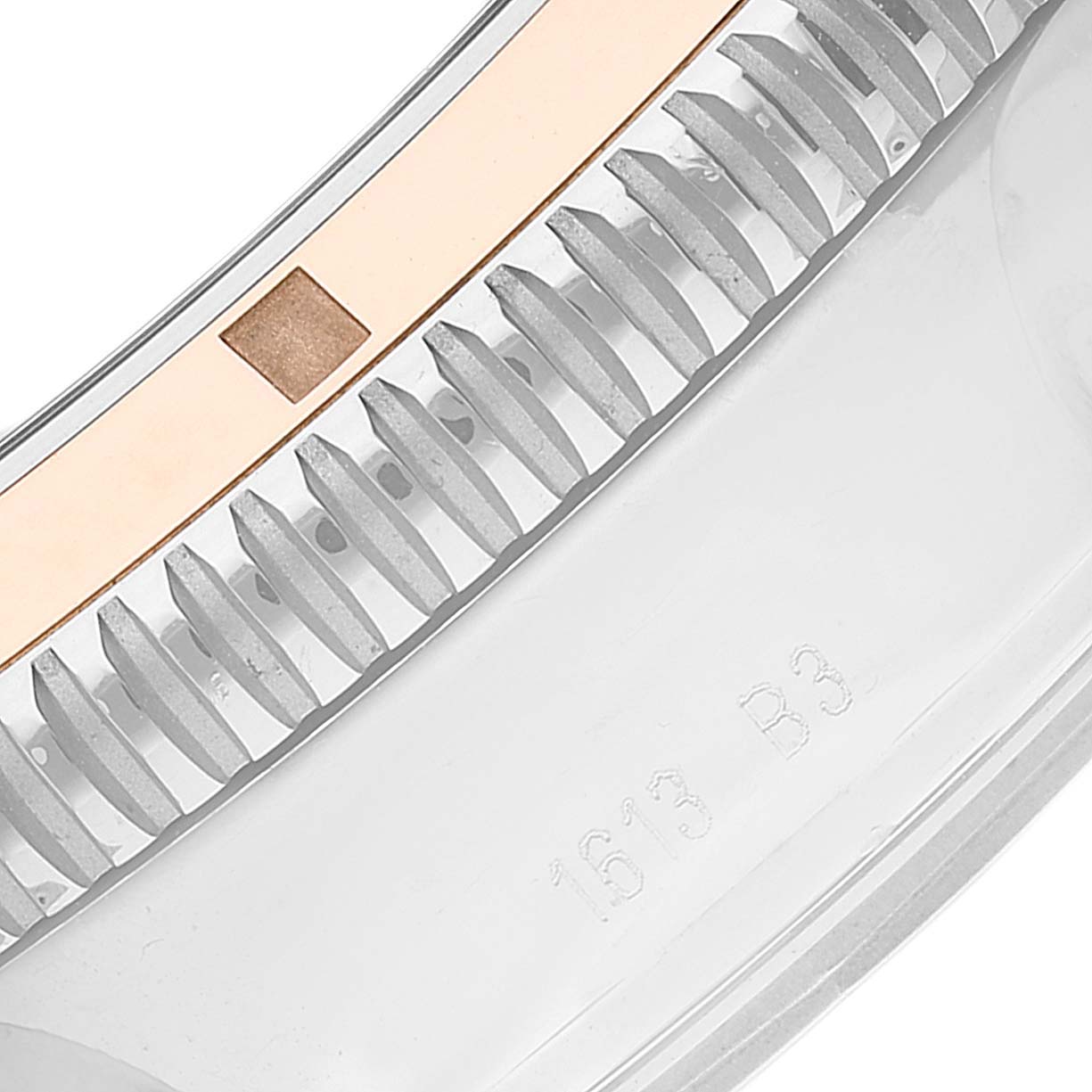 This image shows a close-up of the bezel of a Breitling Superocean U1332012/B908-152A Men's Steel and Gold (two tone) Black Dial U1332012/B908-152A Men's Steel and Gold (two tone) Black Dial watch.