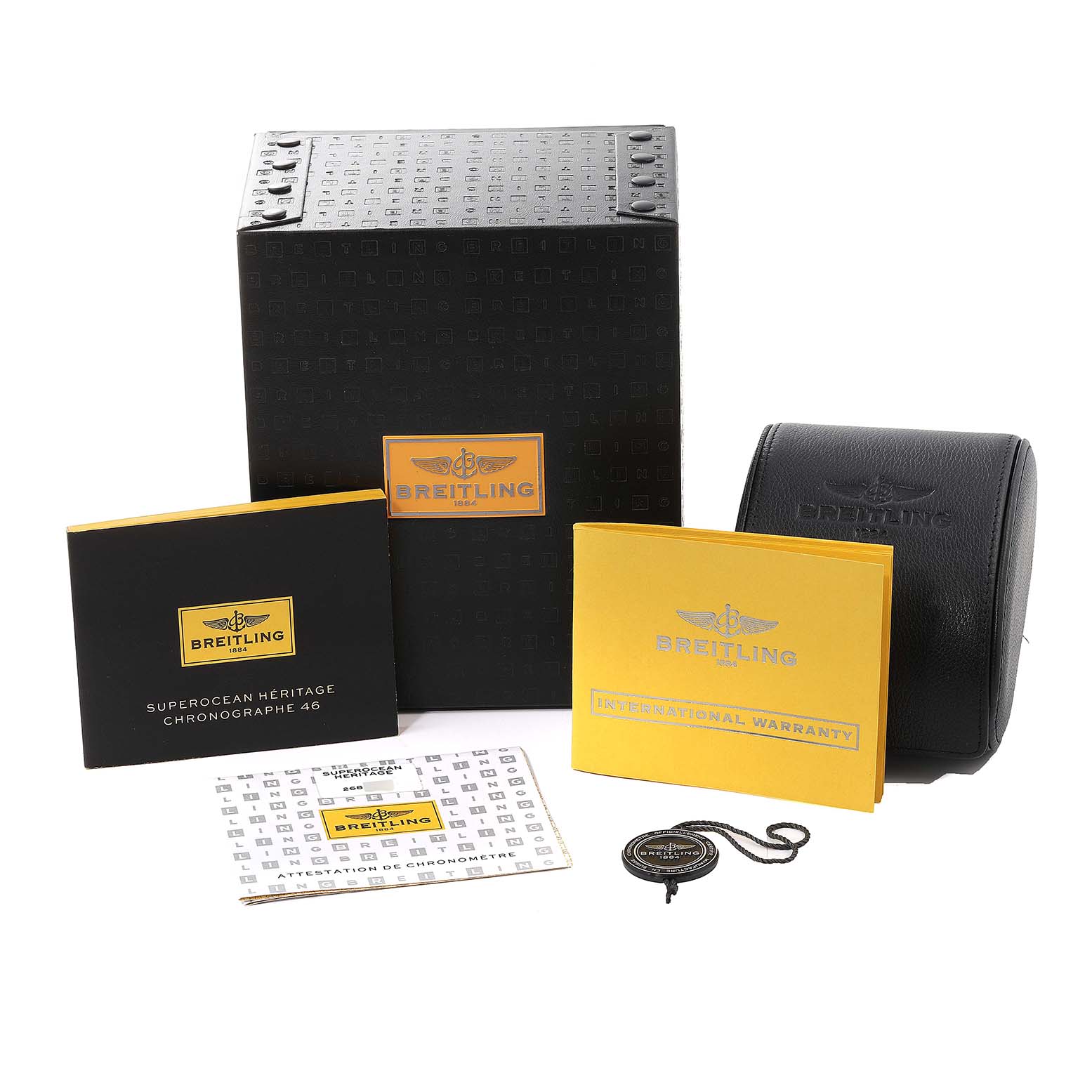 This image shows the box, manual, warranty card, and case for a Breitling Superocean U1332012/B908-152A Men's Steel and Gold (two tone) Black Dial U1332012/B908-152A Men's Steel and Gold (two tone) Black Dial model watch, viewed from the front.