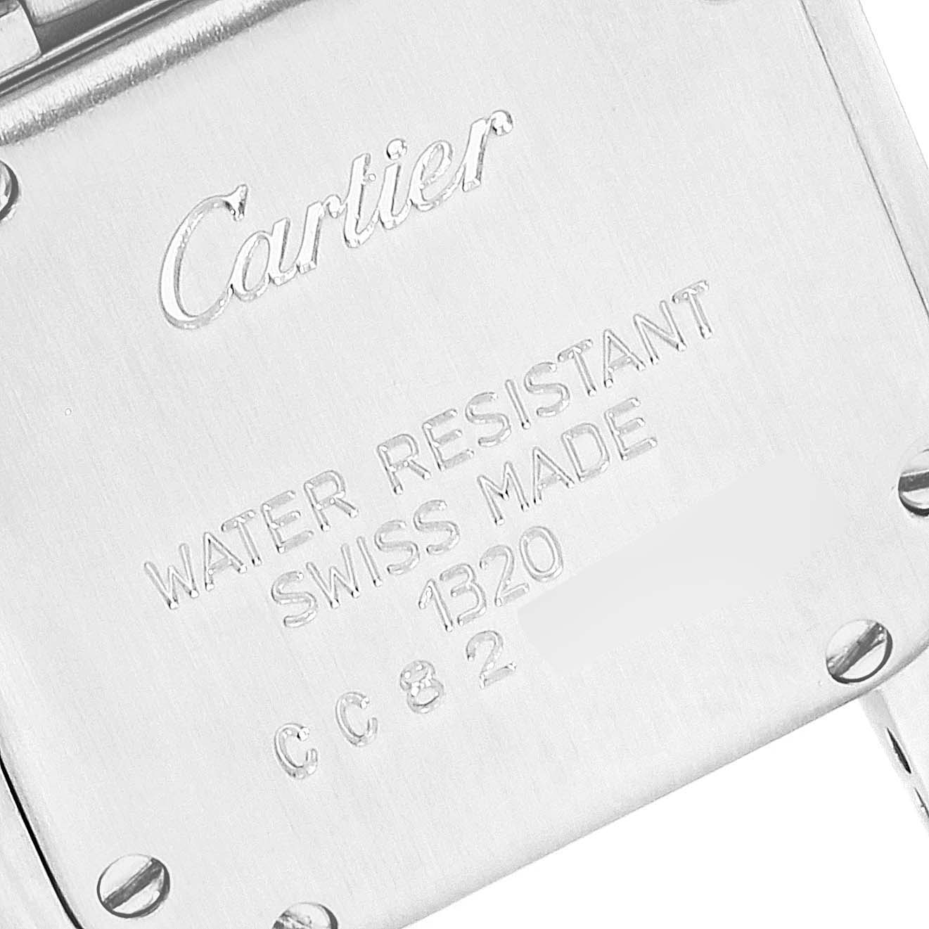 This image shows the back case of a Cartier Panthere W25033P5 Women
s Stainless Steel Silver Dial W25033P5 Women
s Stainless Steel Silver Dial watch, highlighting the engraved inscriptions.