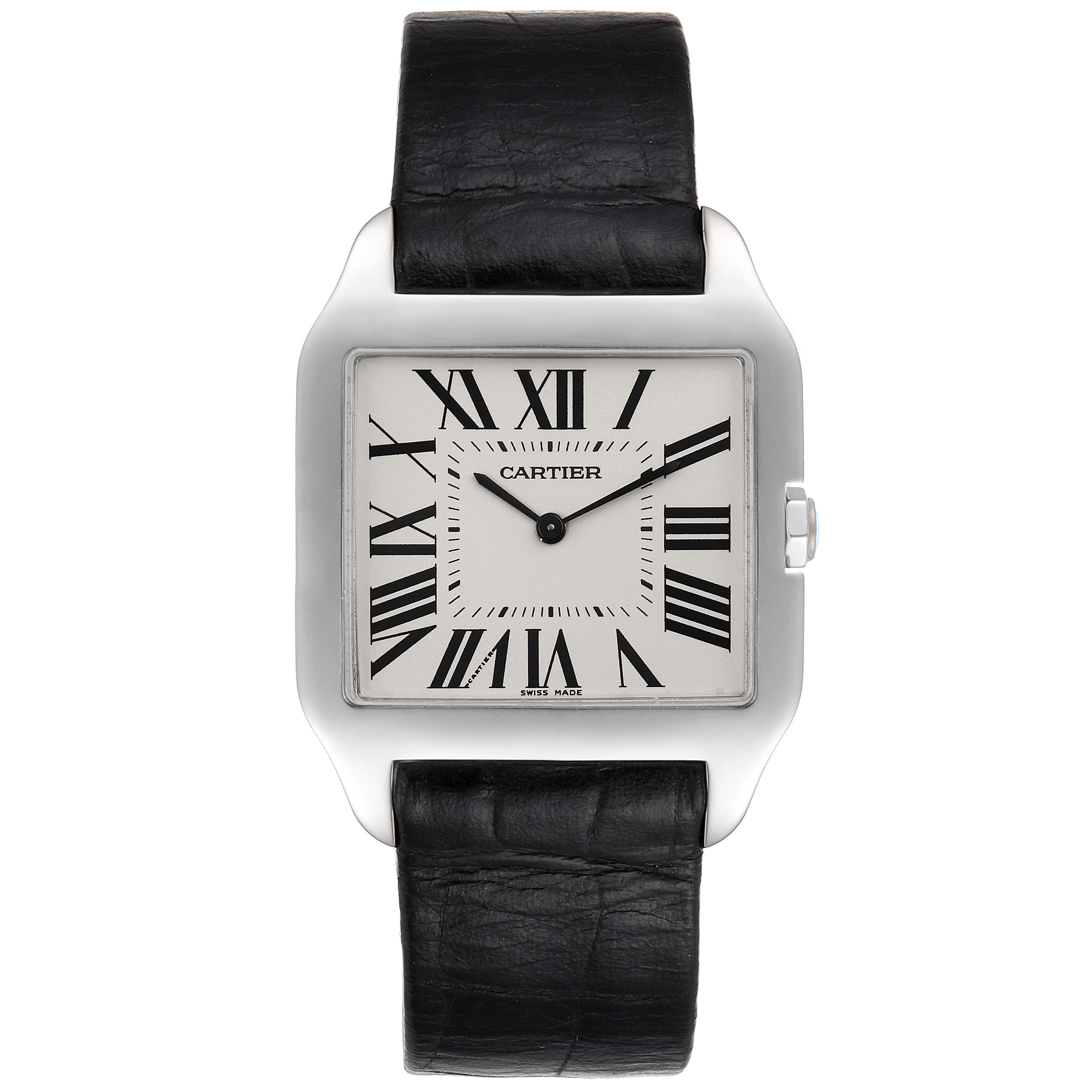 The image shows a front view of the Cartier Santos Dumont W2007051 Men's White Gold Silver Dial W2007051 Men's White Gold Silver Dial watch, featuring a square dial, Roman numerals, and a black leather strap.