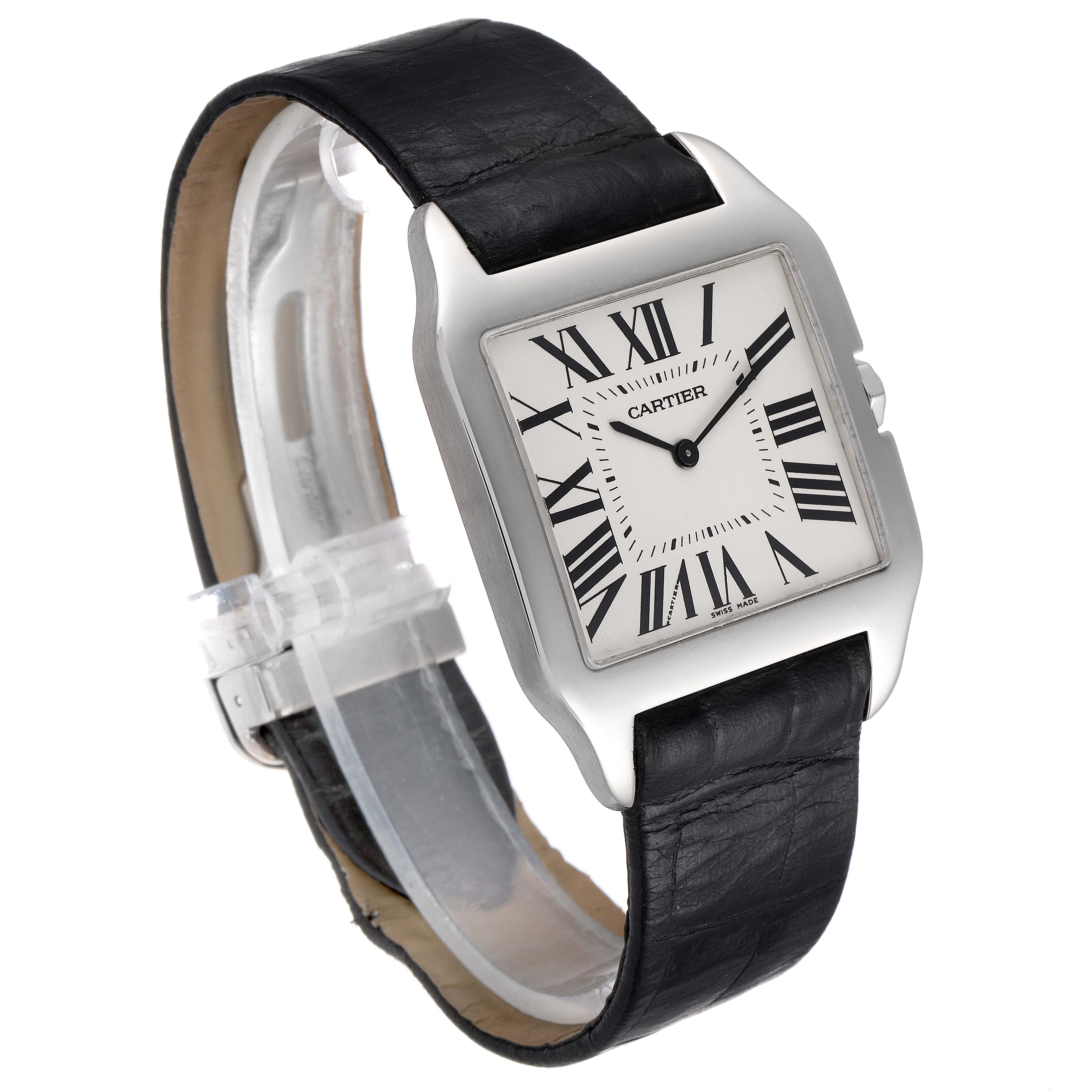 The Cartier Santos Dumont W2007051 Men's White Gold Silver Dial W2007051 Men's White Gold Silver Dial watch is shown at a slight angle, featuring its face, bezel, and black leather strap.