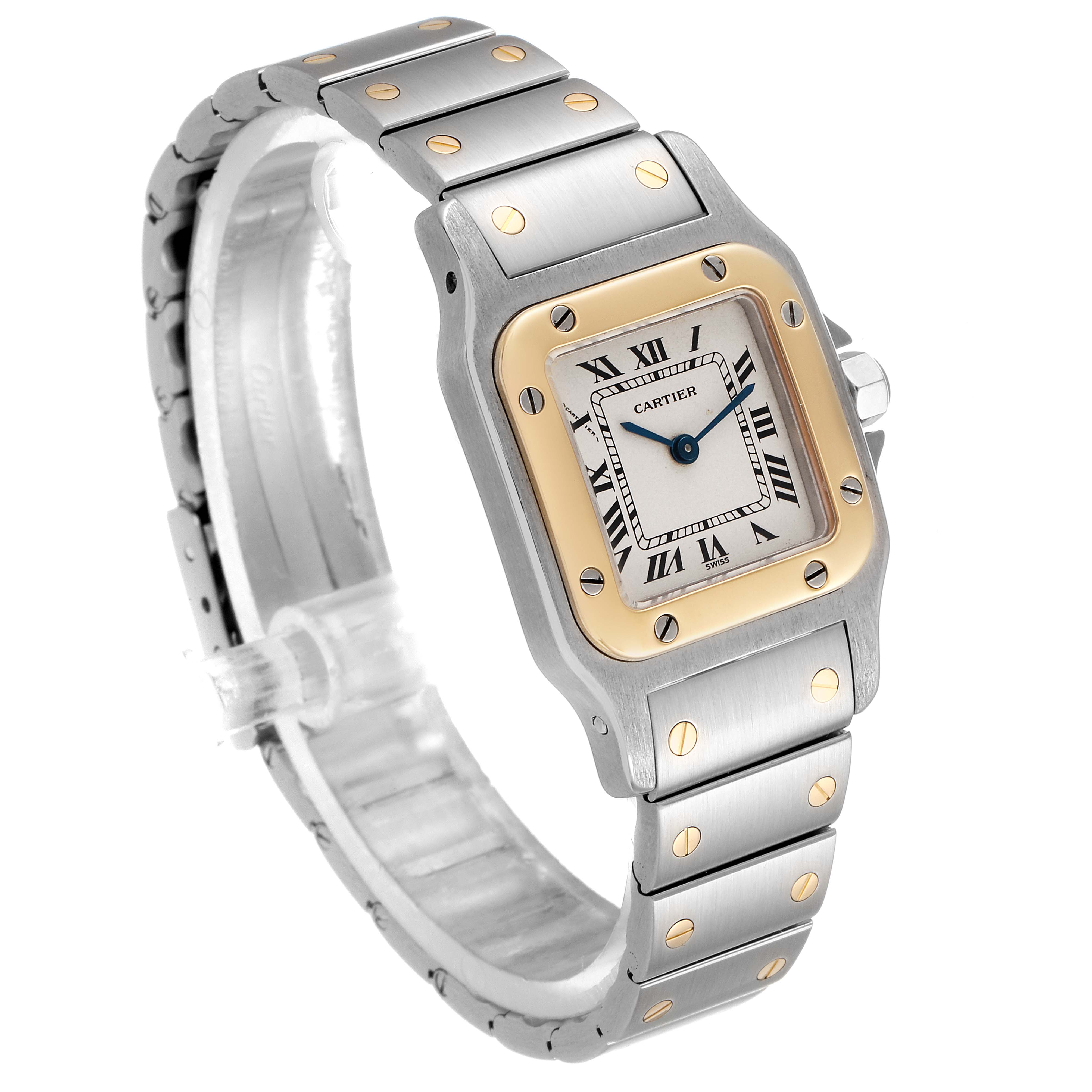 The image shows the Cartier Santos 166930 Women's Steel and Gold (two tone) Silver Dial 166930 Women's Steel and Gold (two tone) Silver Dial watch at a three-quarter angle, featuring its square face, gold bezel, Roman numerals, and metal bracelet.
