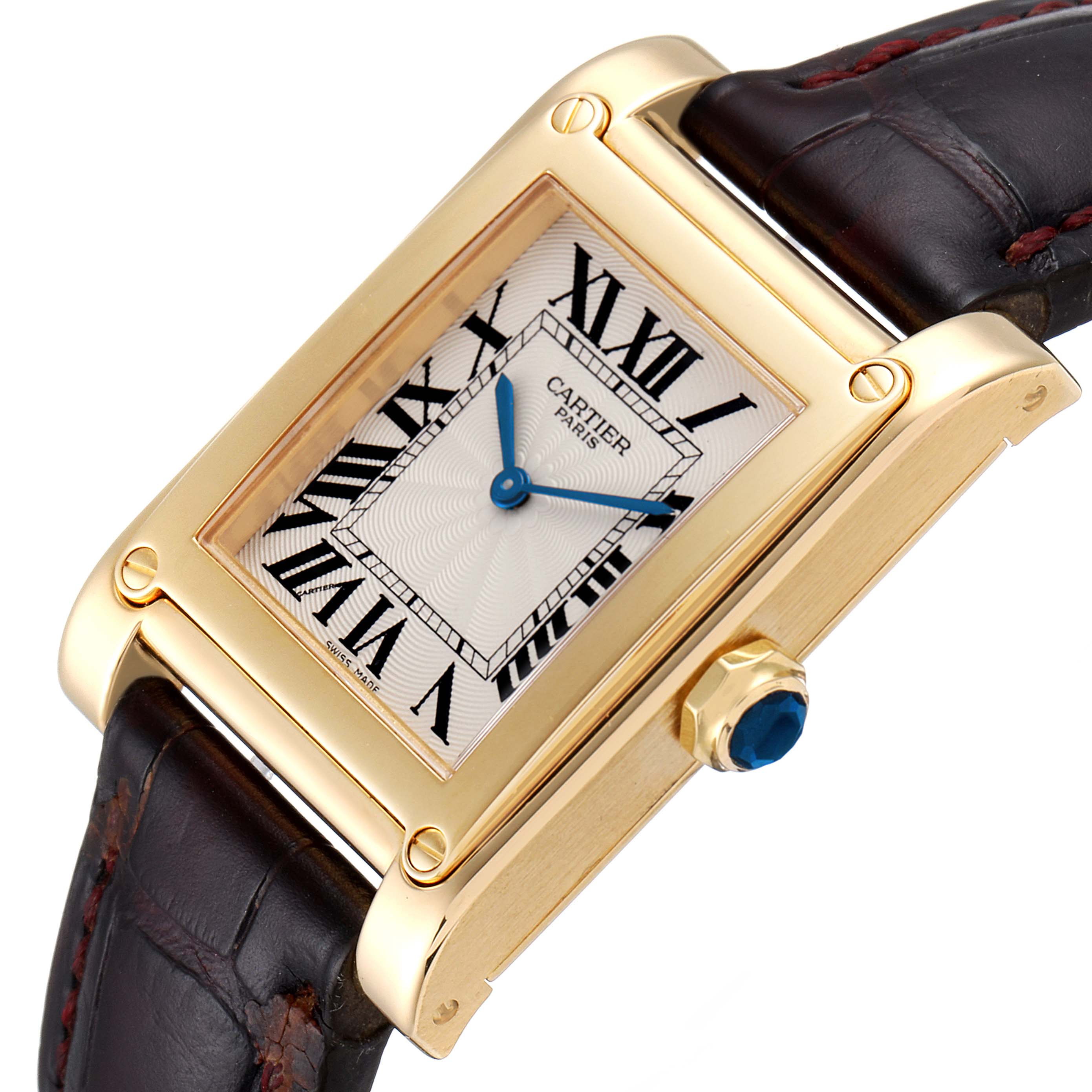 The image shows a close-up angle of the Cartier Tank A Vis W1539951 Men's Yellow Gold Silver Dial W1539951 Men's Yellow Gold Silver Dial model, highlighting the gold case, Roman numeral dial, blue hands, and crown with a blue cabochon.