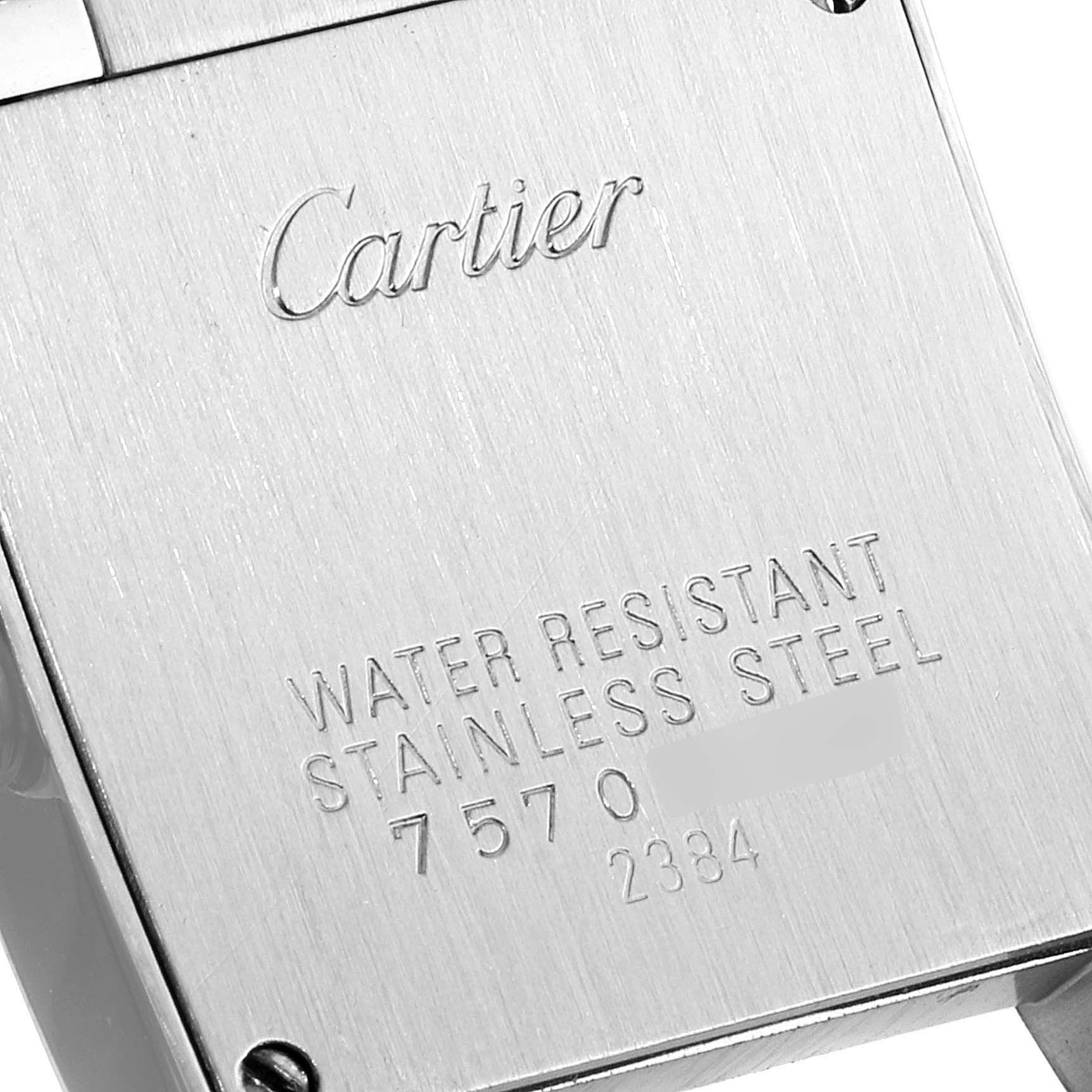 This image shows the back case of a Tank Francaise model by Cartier in a close-up angle.