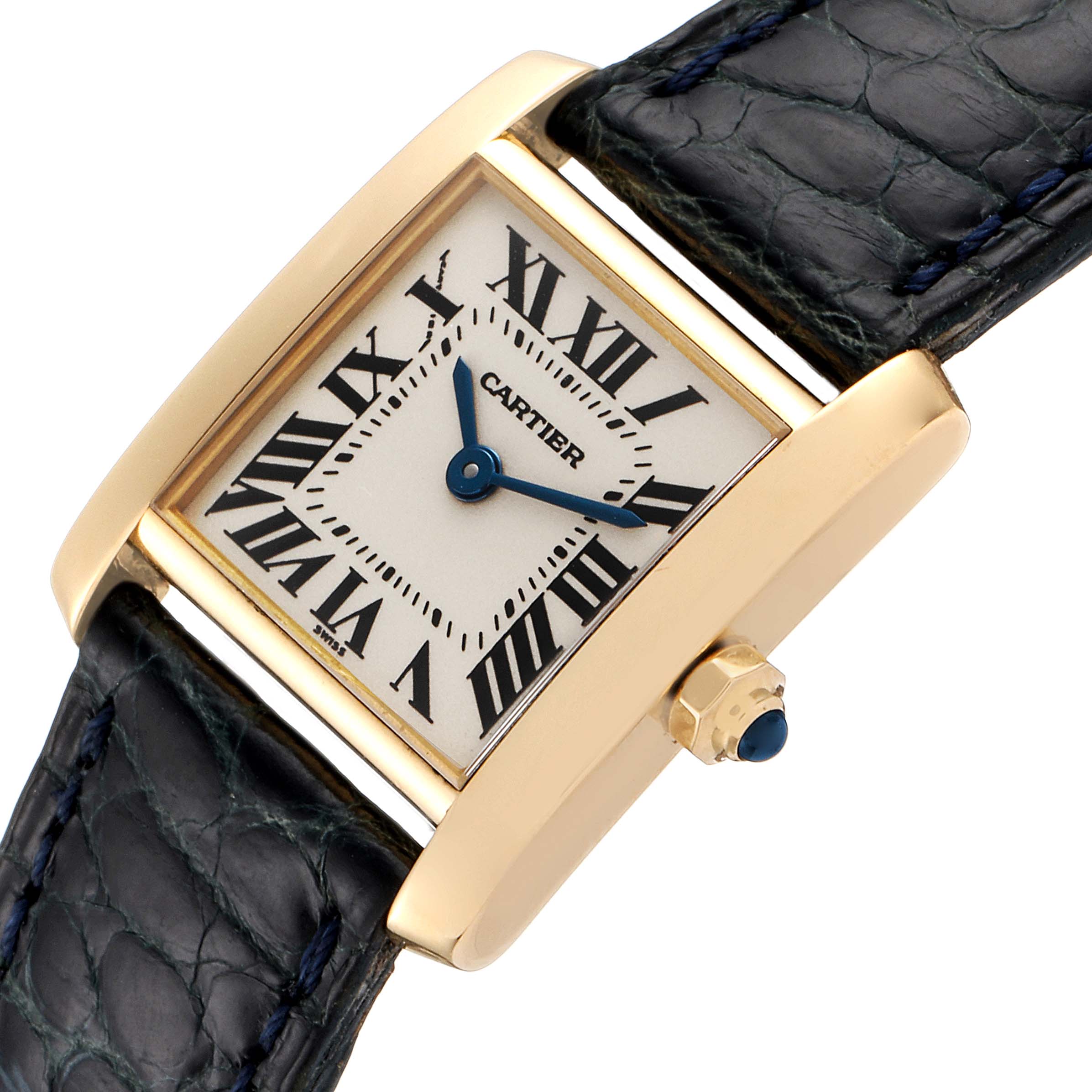 Shown at a slight angle, this Cartier Tank Française watch features the face, crown, and part of the leather strap.