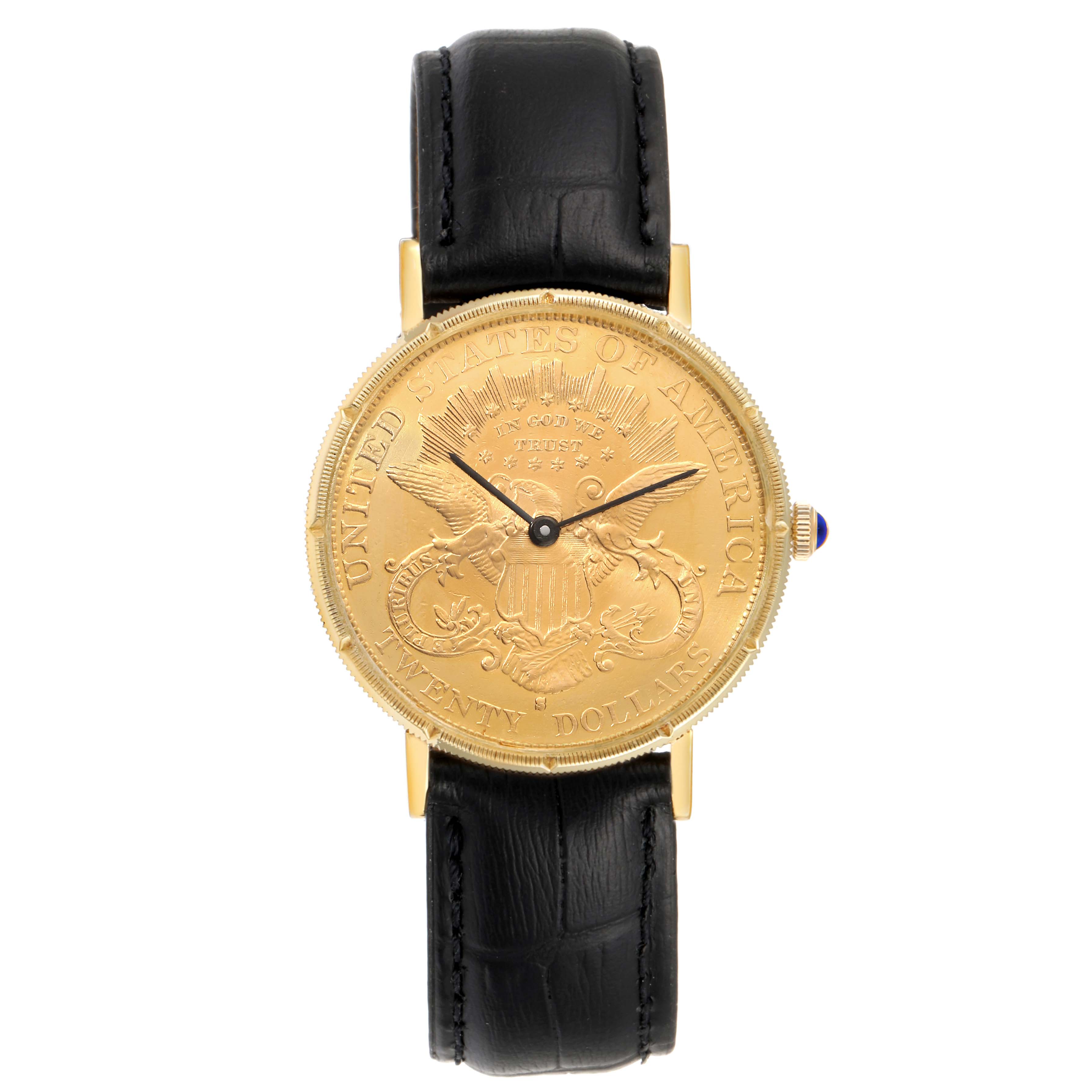 The image shows a front view of the Baume Mercier 20 Dollars Double Eagle Yellow Gold Coin Automatic Mens Watch 1873 model with a black leather strap.