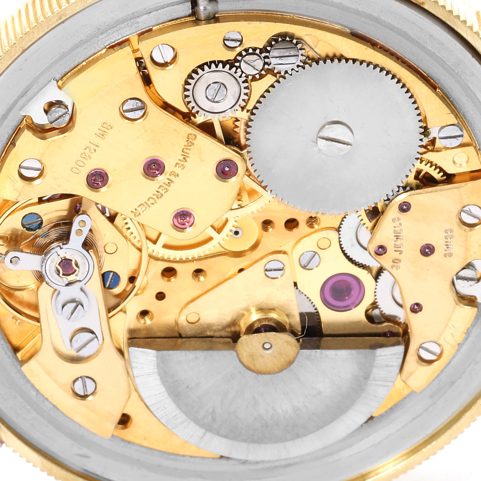 This image shows a detailed close-up of the internal mechanical parts of the Baume Mercier 20 Dollars Double Eagle Yellow Gold Coin Automatic Men's Watch 1873 model by Baume & Mercier  Men's Yellow Gold Black Dial  Men's Yellow Gold Black Dial.