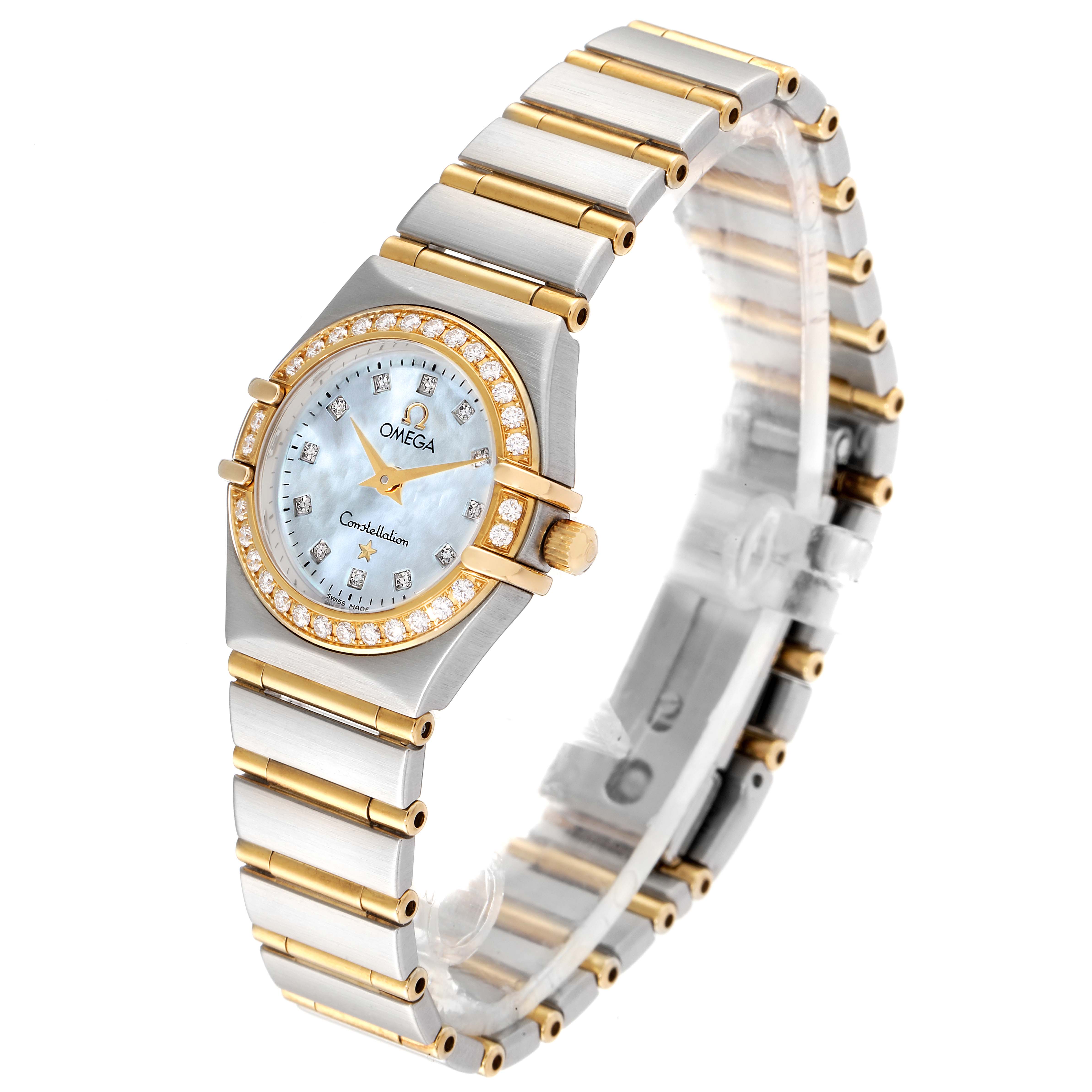 The watch is shown at a three-quarter angle, displaying the face, bezel, and bracelet of the Omega 1267.75.00 Women
s Steel and Gold (two tone) Mother of Pearl Dial 1267.75.00 Women
s Steel and Gold (two tone) Mother of Pearl Dial Constellation 95 Mother of Pearl Diamond Ladies Watch 1267.75.00.
