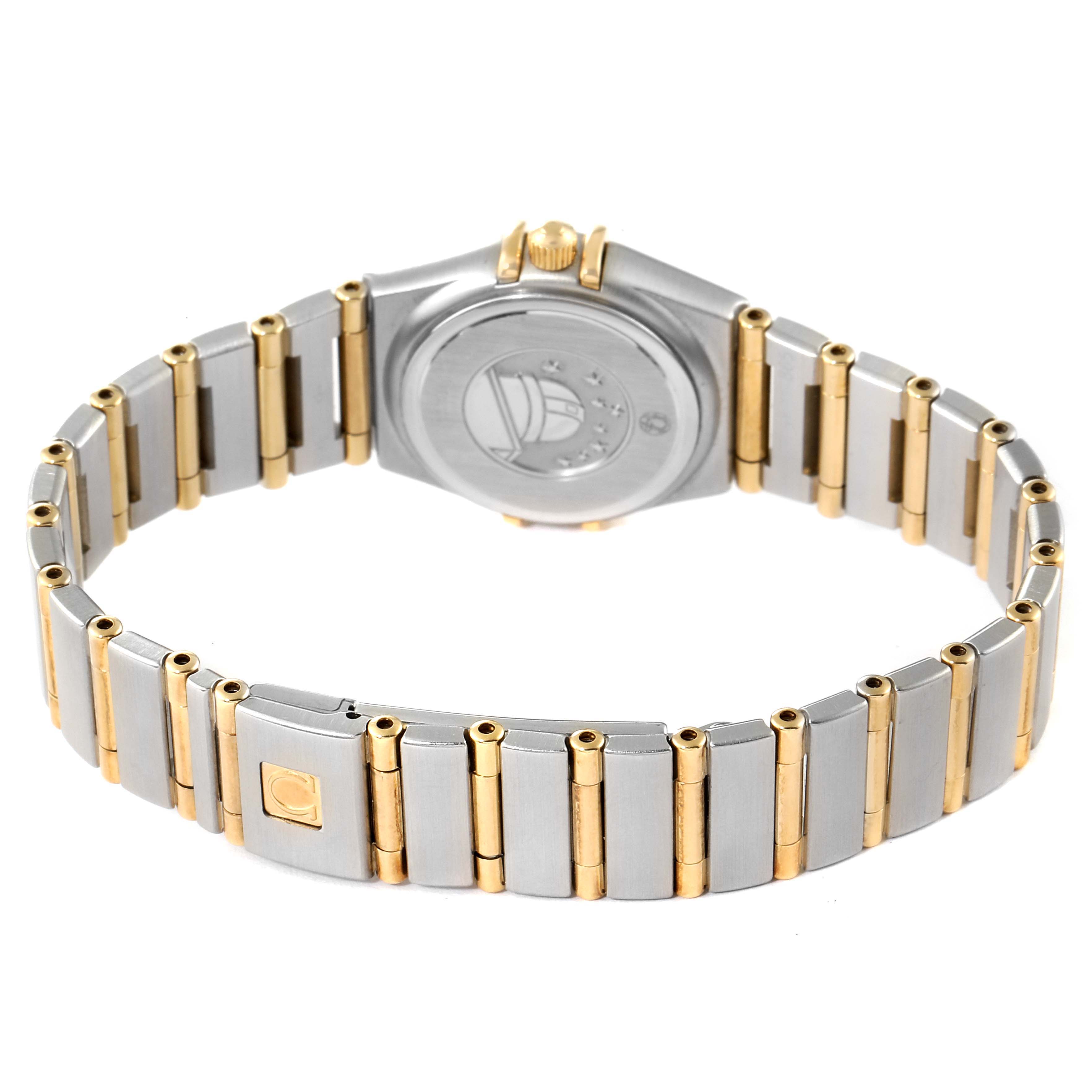 The image shows the back side and bracelet of the Omega 1267.75.00 Women
s Steel and Gold (two tone) Mother of Pearl Dial 1267.75.00 Women
s Steel and Gold (two tone) Mother of Pearl Dial Constellation 95 Mother of Pearl Diamond Ladies Watch 1267.75.00.