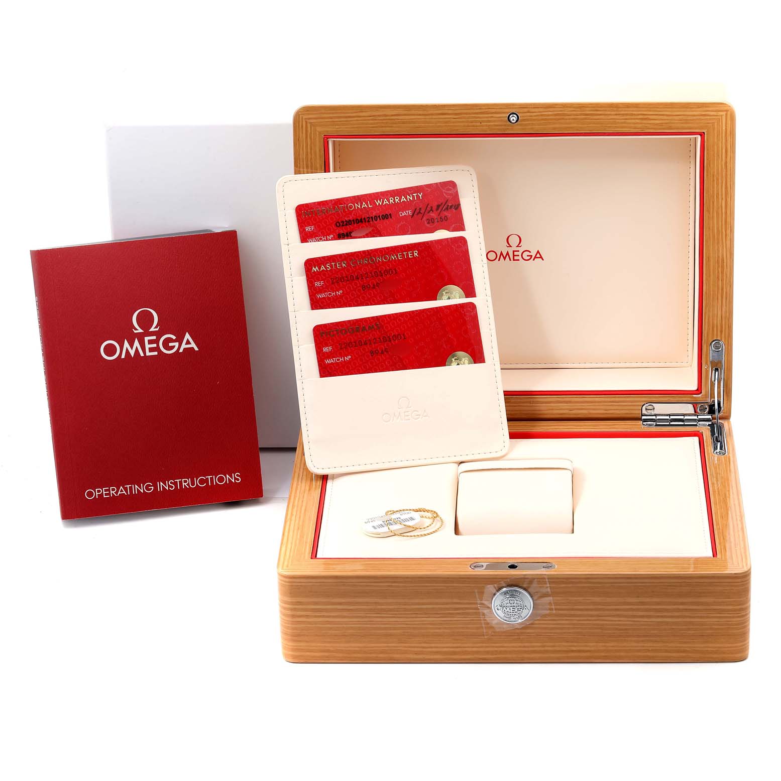 The image shows the packaging, operating instructions, and warranty cards for the Omega Seamaster 220.10.41.21.01.001 Men's Stainless Steel Black Dial 220.10.41.21.01.001 Men's Stainless Steel Black Dial watch.