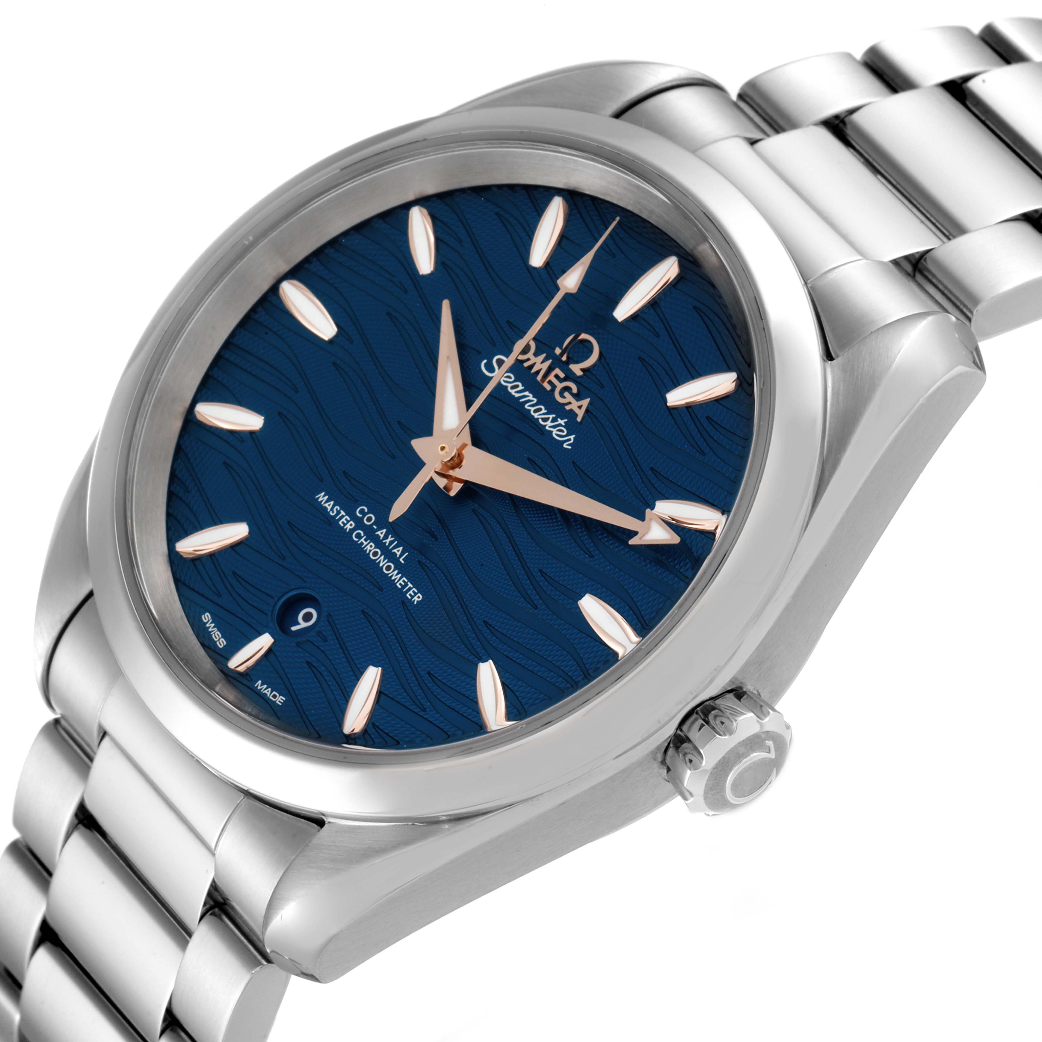 The image shows a side angle of the Omega Aqua Terra 220.10.38.20.03.002 Men
s Stainless Steel Blue Dial 220.10.38.20.03.002 Men
s Stainless Steel Blue Dial watch, highlighting its blue dial, hands, and stainless steel bracelet.