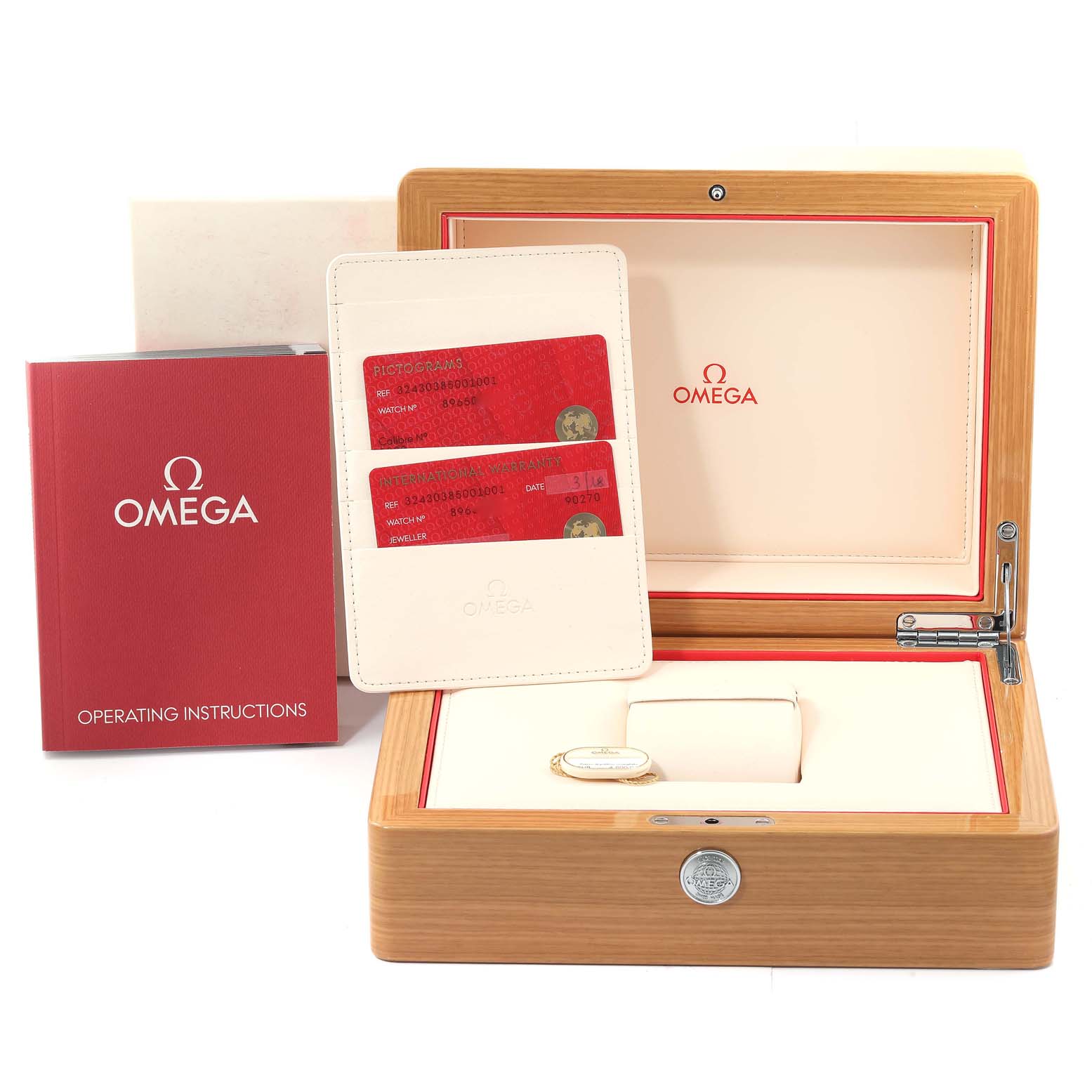 The image shows the packaging and accessories for an Omega Speedmaster 324.30.38.50.01.001 Men's Stainless Steel Black Dial 324.30.38.50.01.001 Men's Stainless Steel Black Dial, including a box, operating instructions, and cards.