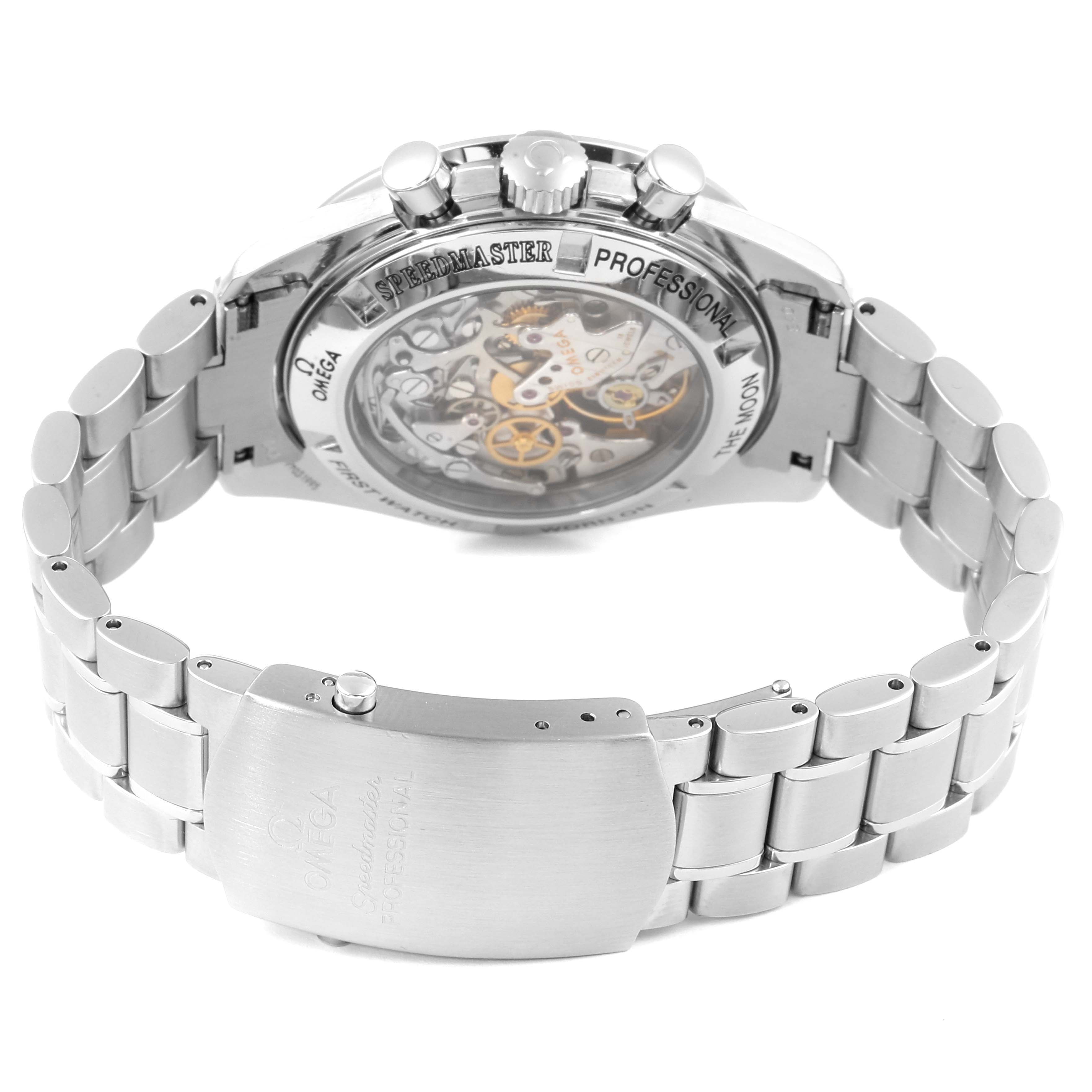 The image shows the back and side view of an Omega Speedmaster 3572.50.00 Men
s Stainless Steel Black Dial 3572.50.00 Men
s Stainless Steel Black Dial watch, highlighting its transparent case back and stainless steel bracelet.