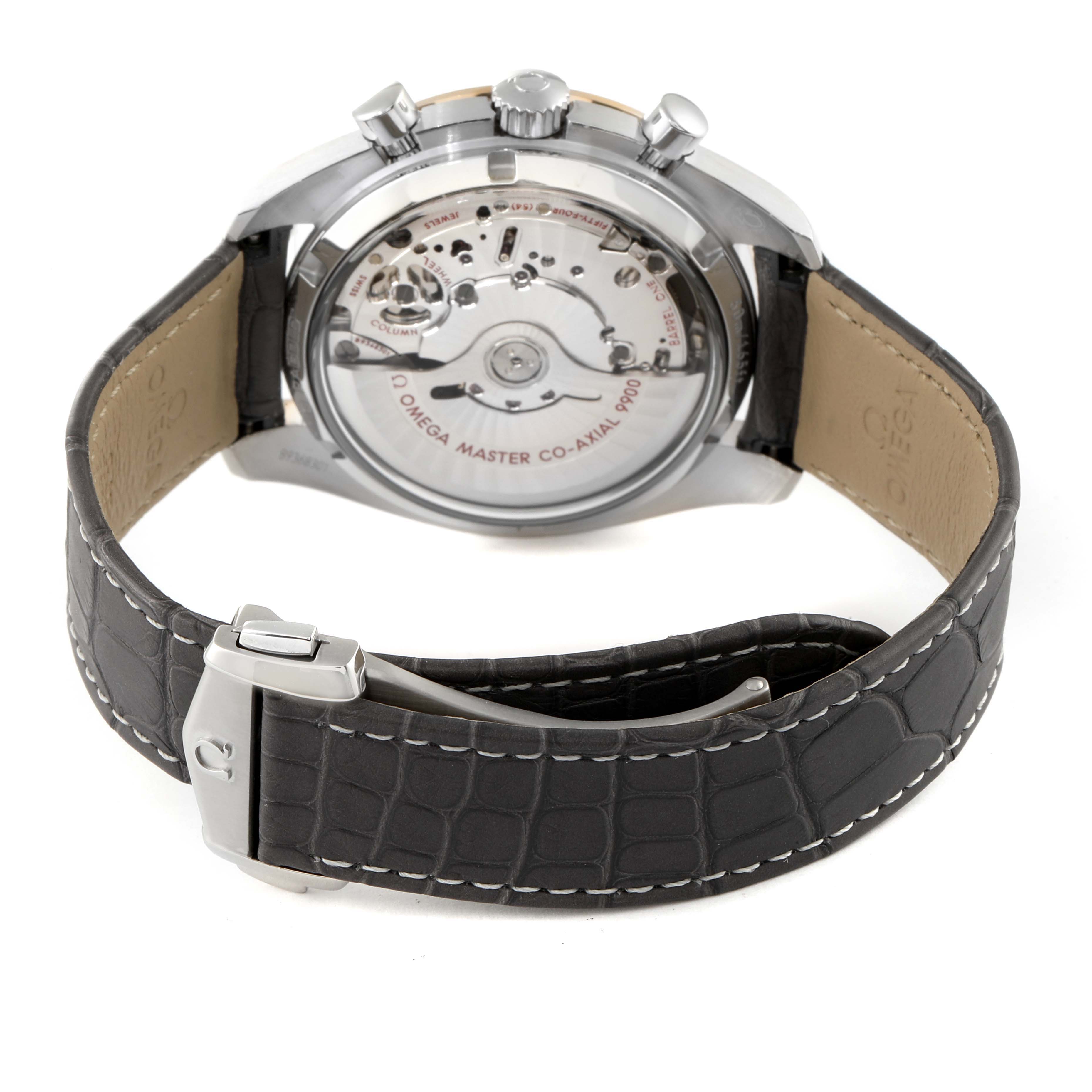 The image shows the back view of an Omega Speedmaster 329.23.44.51.06.001 Men's Steel and Gold (two tone) Grey Dial 329.23.44.51.06.001 Men's Steel and Gold (two tone) Grey Dial watch, highlighting its transparent case back and black leather strap.