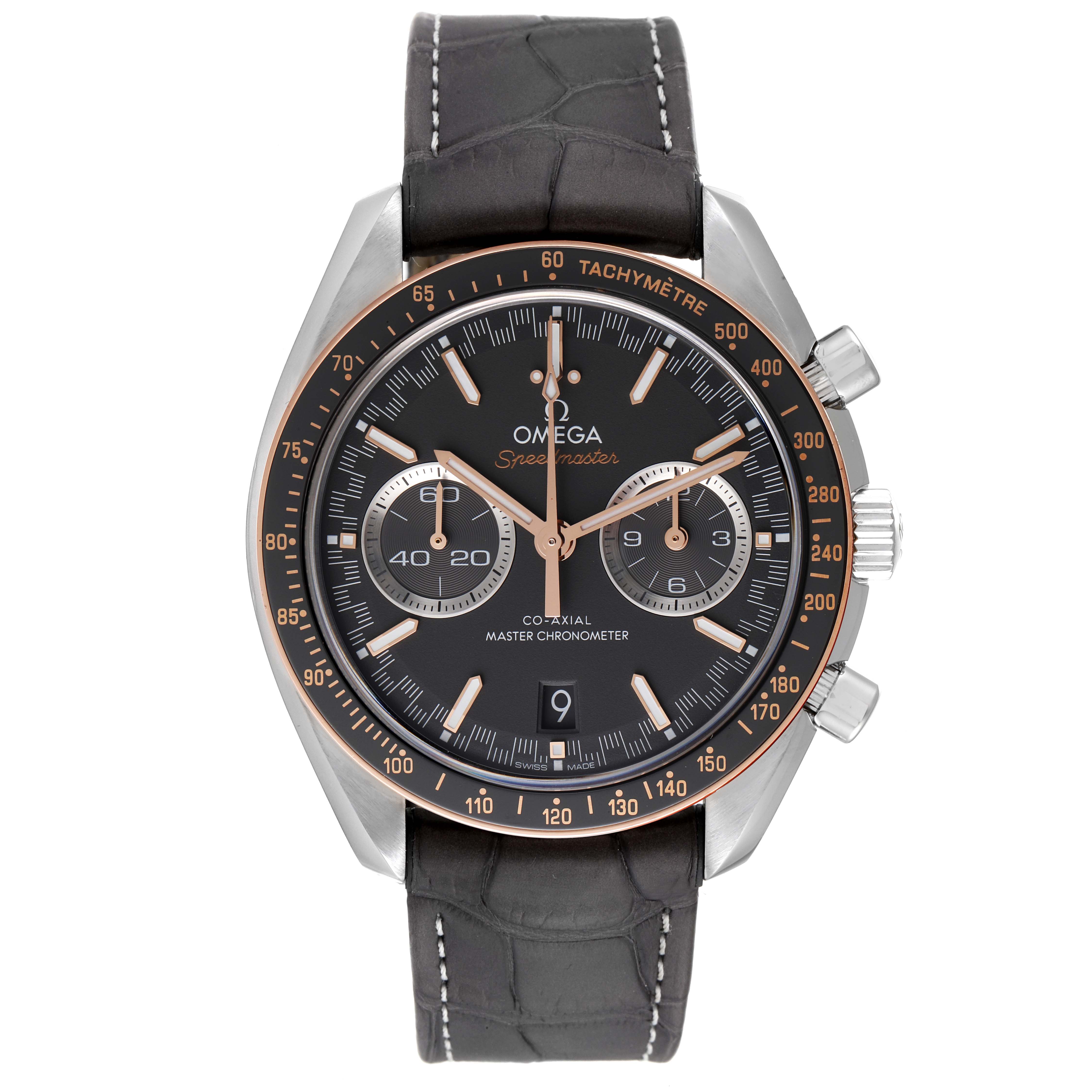 The image shows a frontal view of the Omega Speedmaster 329.23.44.51.06.001 Men's Steel and Gold (two tone) Grey Dial 329.23.44.51.06.001 Men's Steel and Gold (two tone) Grey Dial watch, highlighting the dial, hands, subdials, bezel, and crown.