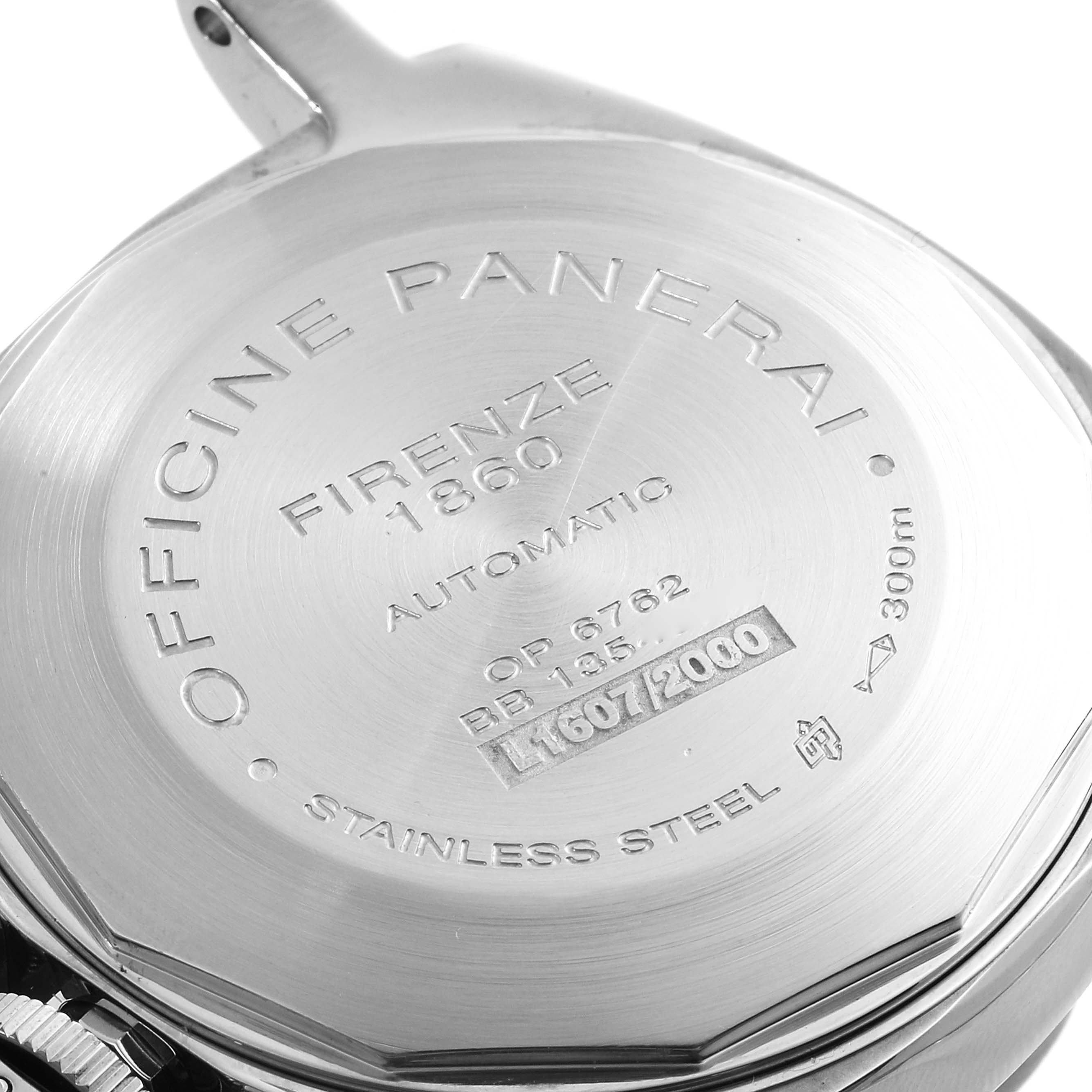 The image shows the back case of a Panerai Luminor PAM00090 Men
s Stainless Steel Black Dial PAM00090 Men
s Stainless Steel Black Dial watch with inscriptions and serial numbers.