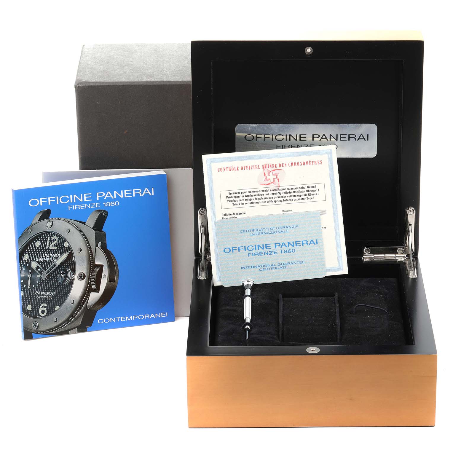 This image shows the packaging, manual, and certificates for a Panerai Submersible PAM00024 Men's Stainless Steel Black Dial PAM00024 Men's Stainless Steel Black Dial watch, with an open wooden box and tools.