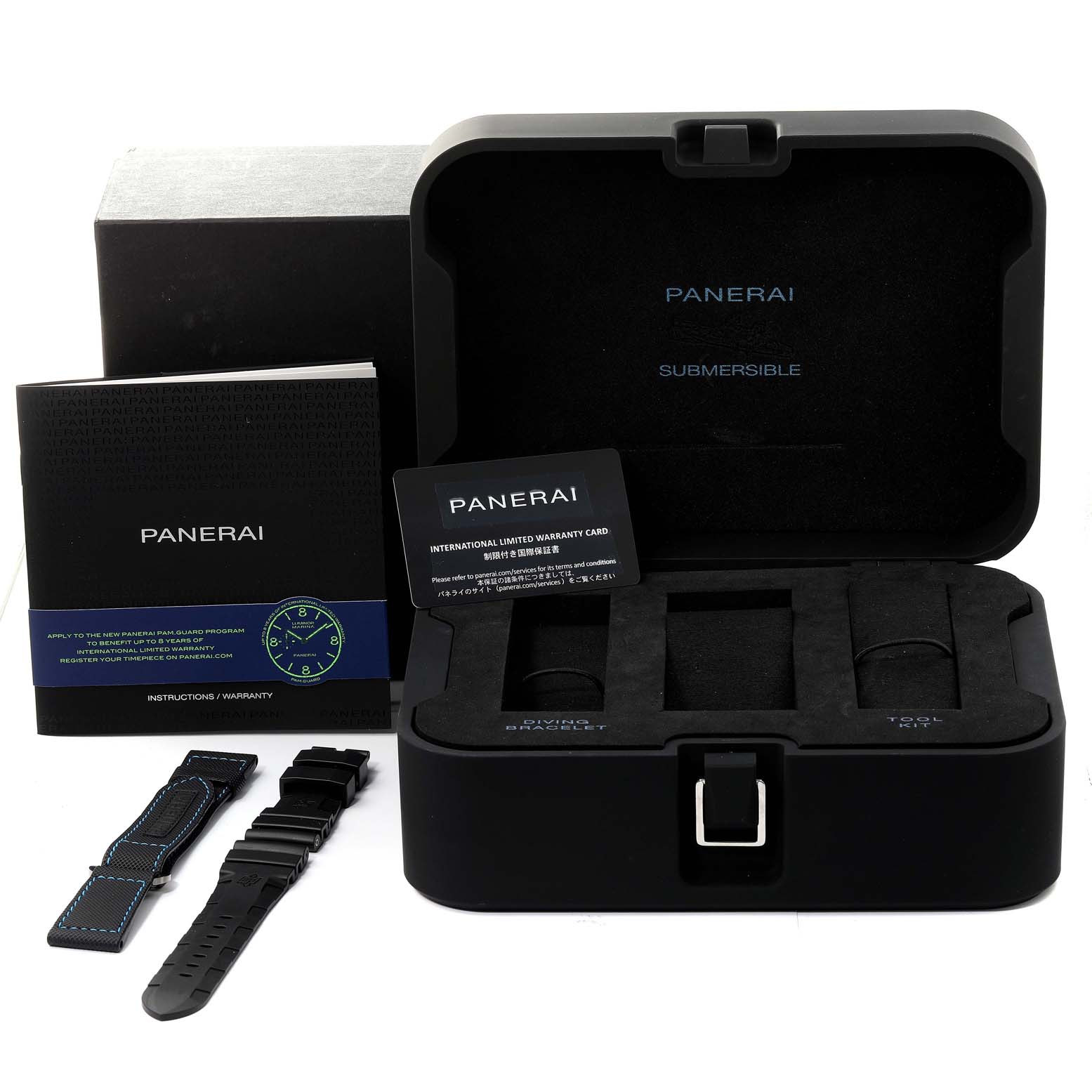 The image shows an open Submersible model Panerai watch box with booklets, warranty card, and additional straps.