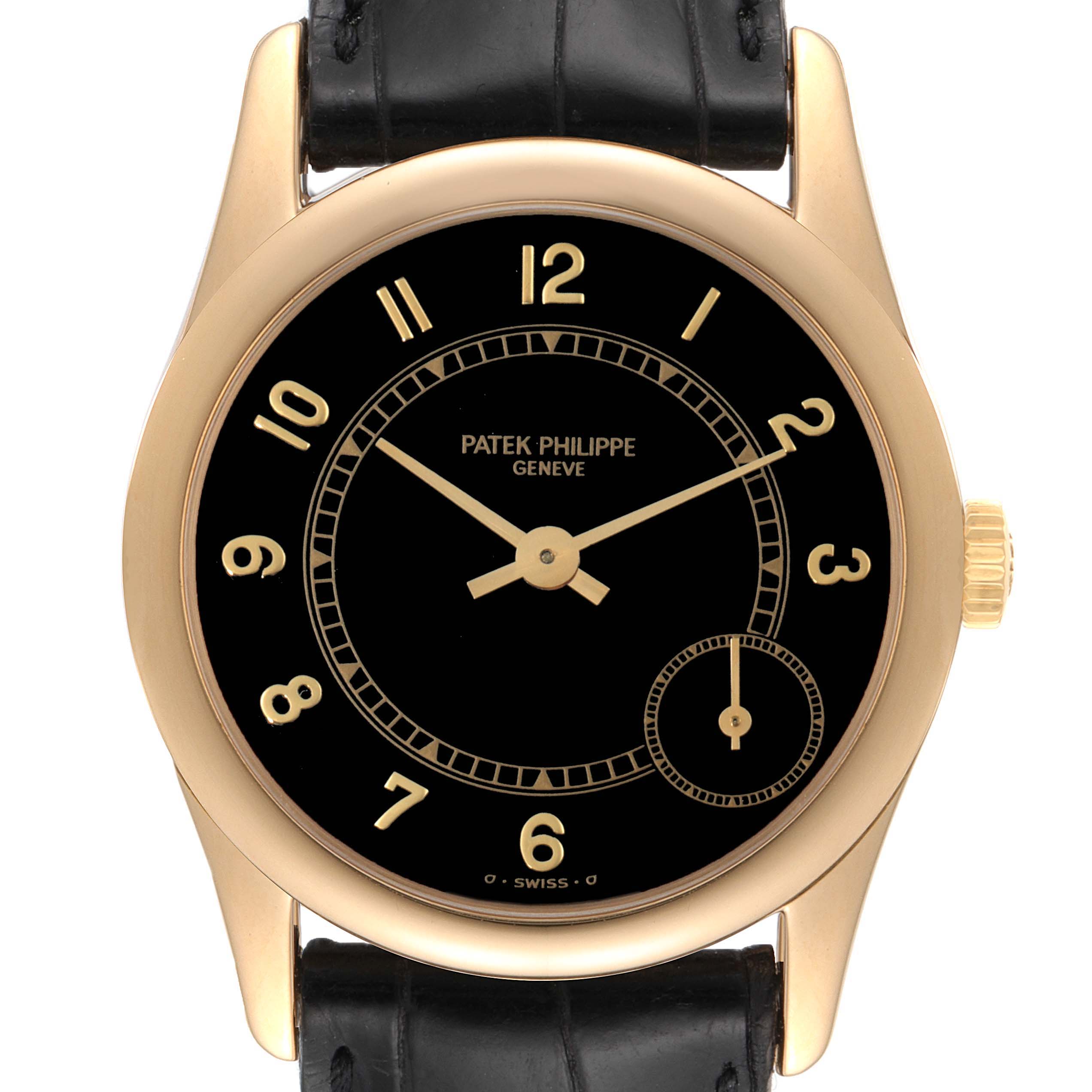This image shows a front view of the Calatrava model watch by Patek Philippe, featuring a black dial and leather strap.