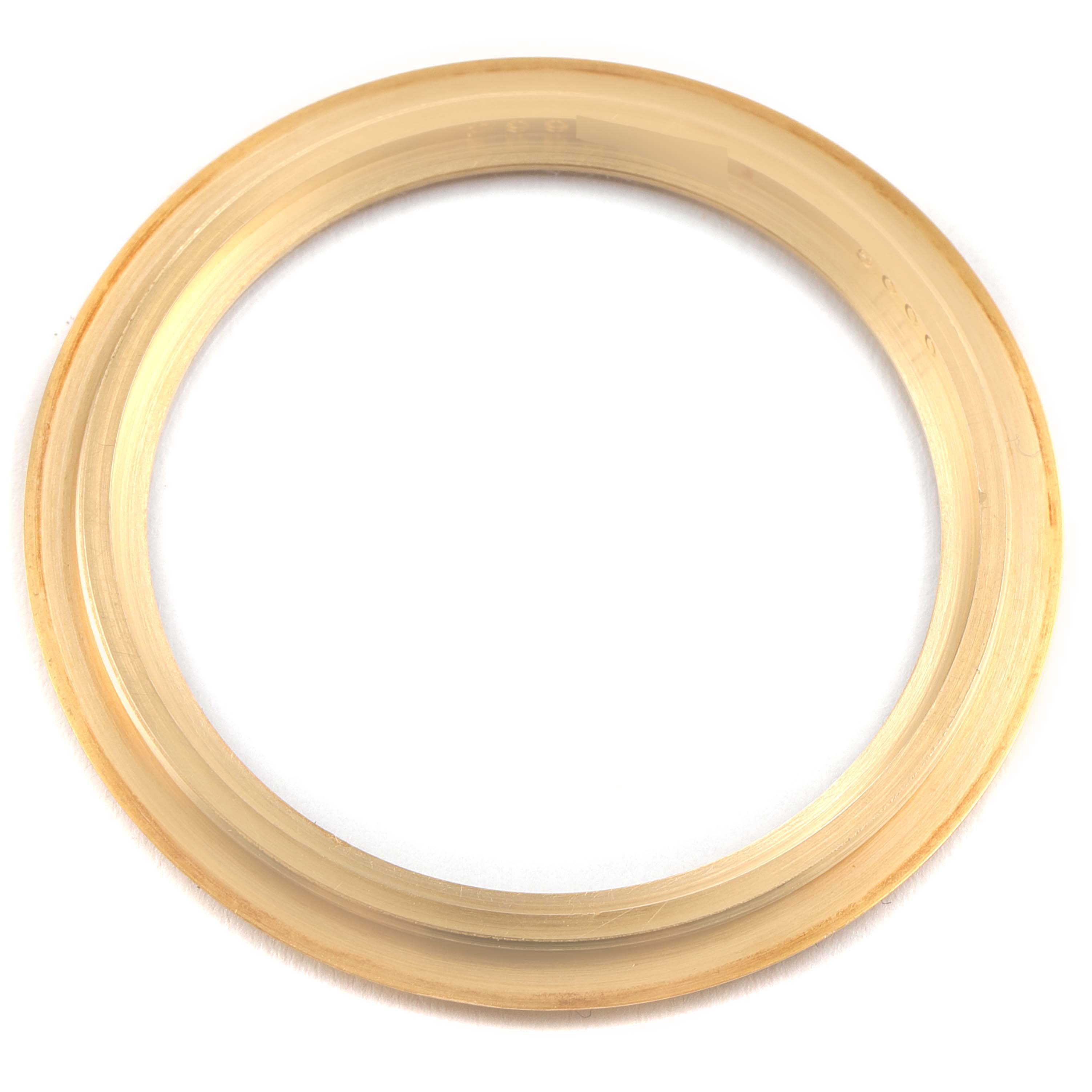 The image shows a bezel for a Patek Philippe Calatrava 5000J Men's Yellow Gold Black Dial 5000J Men's Yellow Gold Black Dial watch, viewed from a top-down angle.