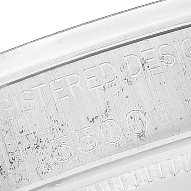 This close-up image shows the engraved inner bezel of a Vintage Collection Rolex model 5500 watch.