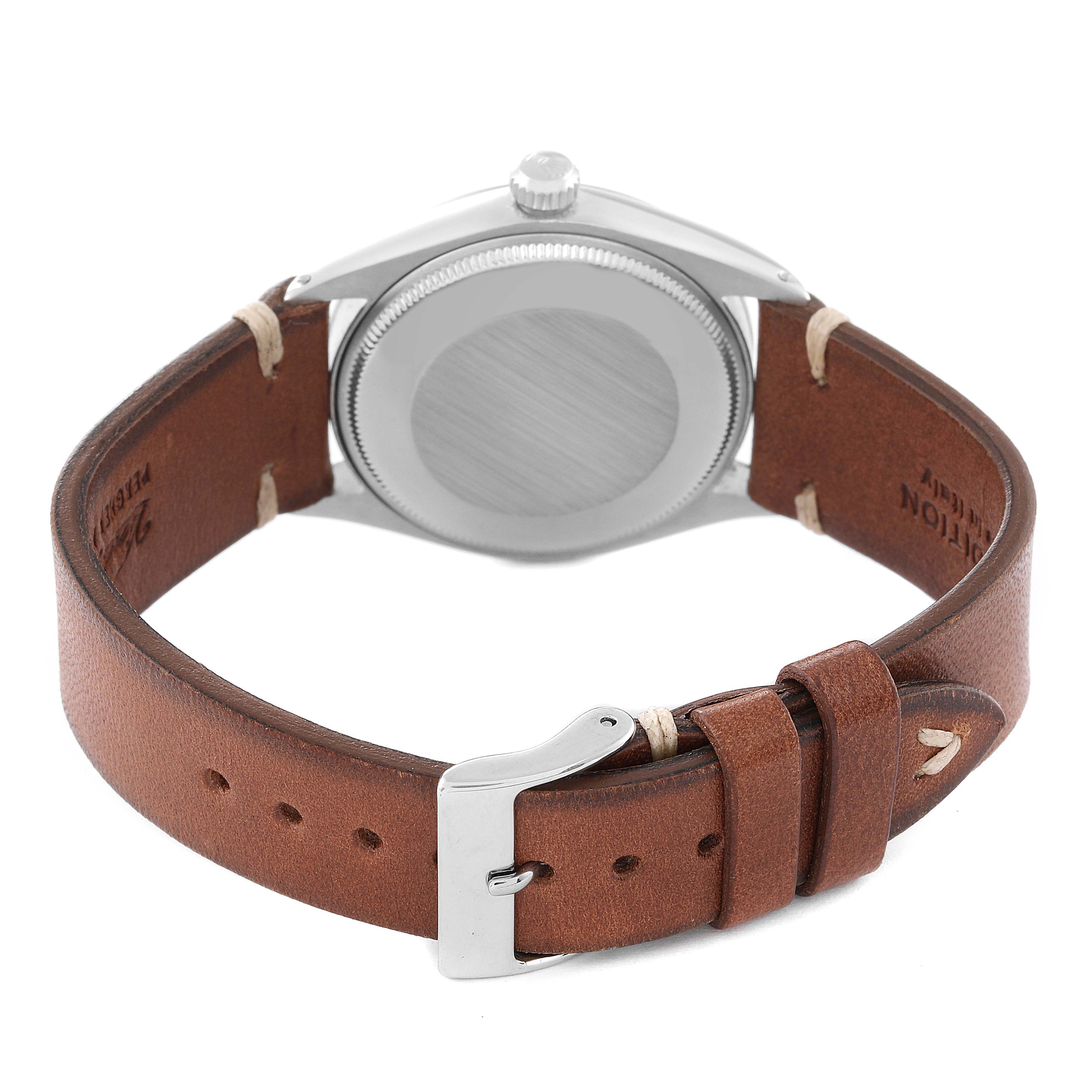 The image shows the case back and leather strap of the Rolex Vintage Collection 5500 Men
s Stainless Steel Silver Dial 5500 Men
s Stainless Steel Silver Dial watch.