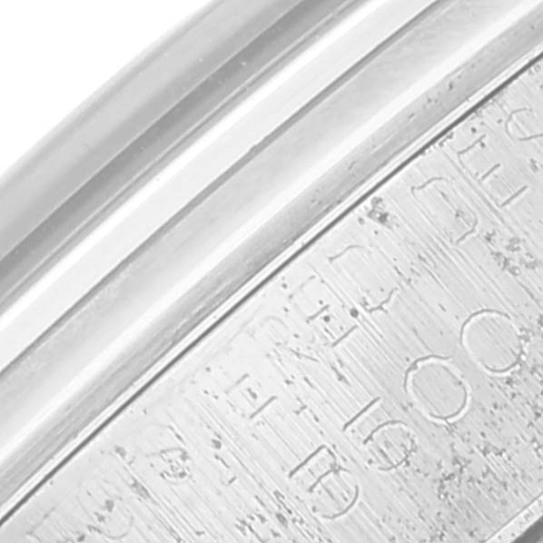 This image shows a close-up angle of the engraved side of the case back on a Rolex Vintage Collection 5500 Men
s Stainless Steel Silver Dial 5500 Men
s Stainless Steel Silver Dial watch.