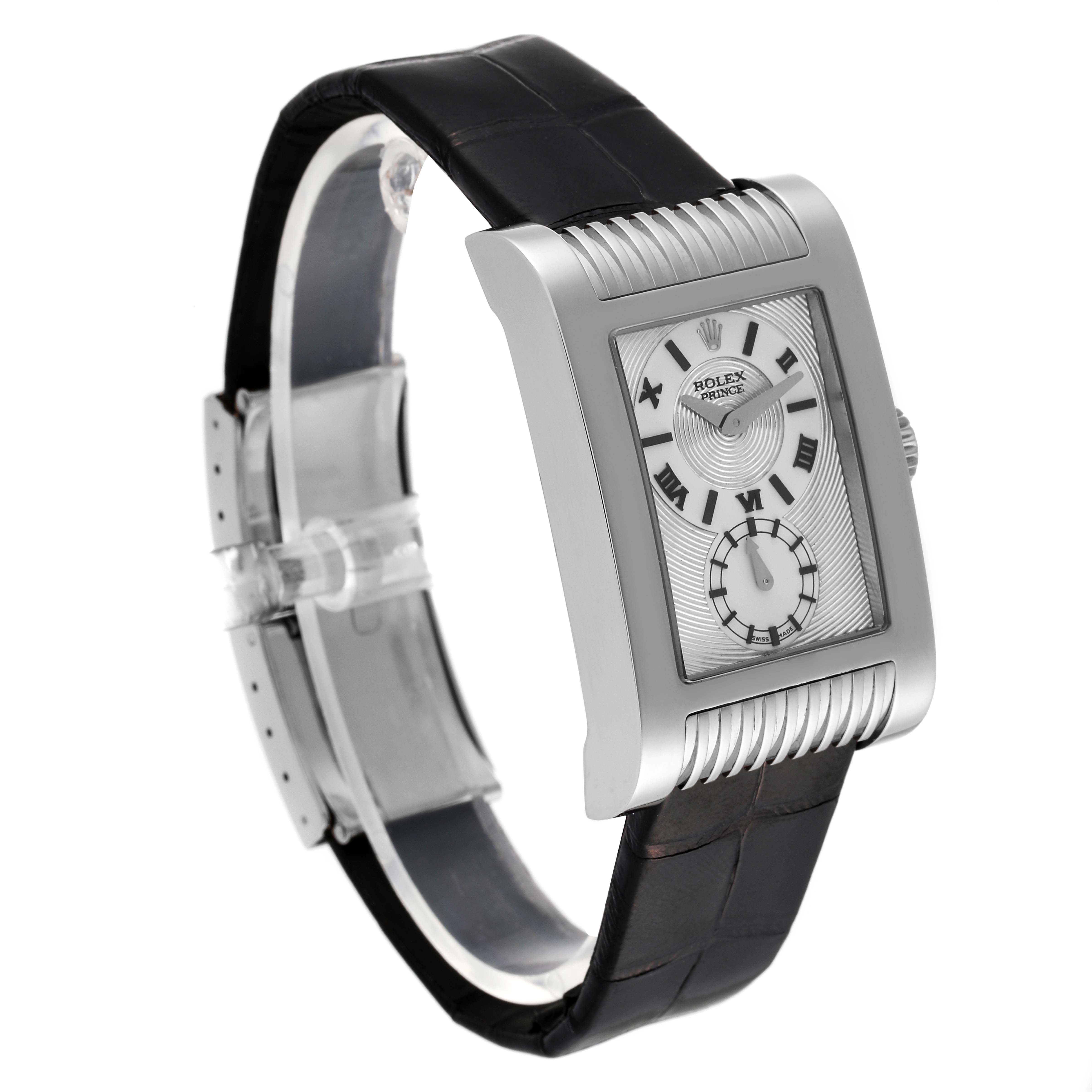 The image showcases a Rolex Cellini 5441 Men
s White Gold Silver Dial 5441 Men
s White Gold Silver Dial watch at a slight left-side angle, highlighting its rectangular face and black leather strap.