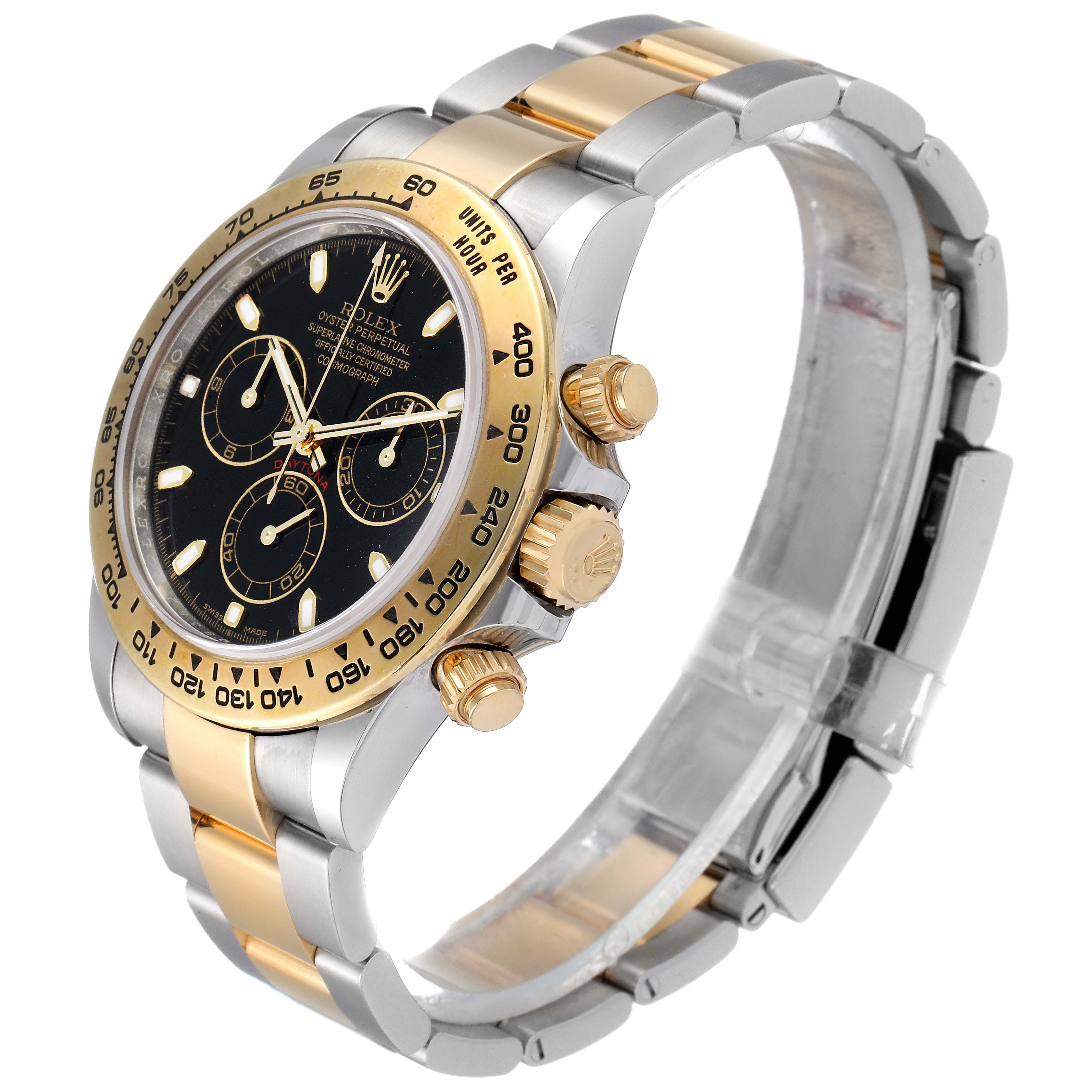 The image shows a Rolex Daytona 116503 Men's Steel and Gold (two tone) Black Dial 116503 Men's Steel and Gold (two tone) Black Dial watch at an angle displaying its black dial, bezel, crown, and two-tone bracelet.
