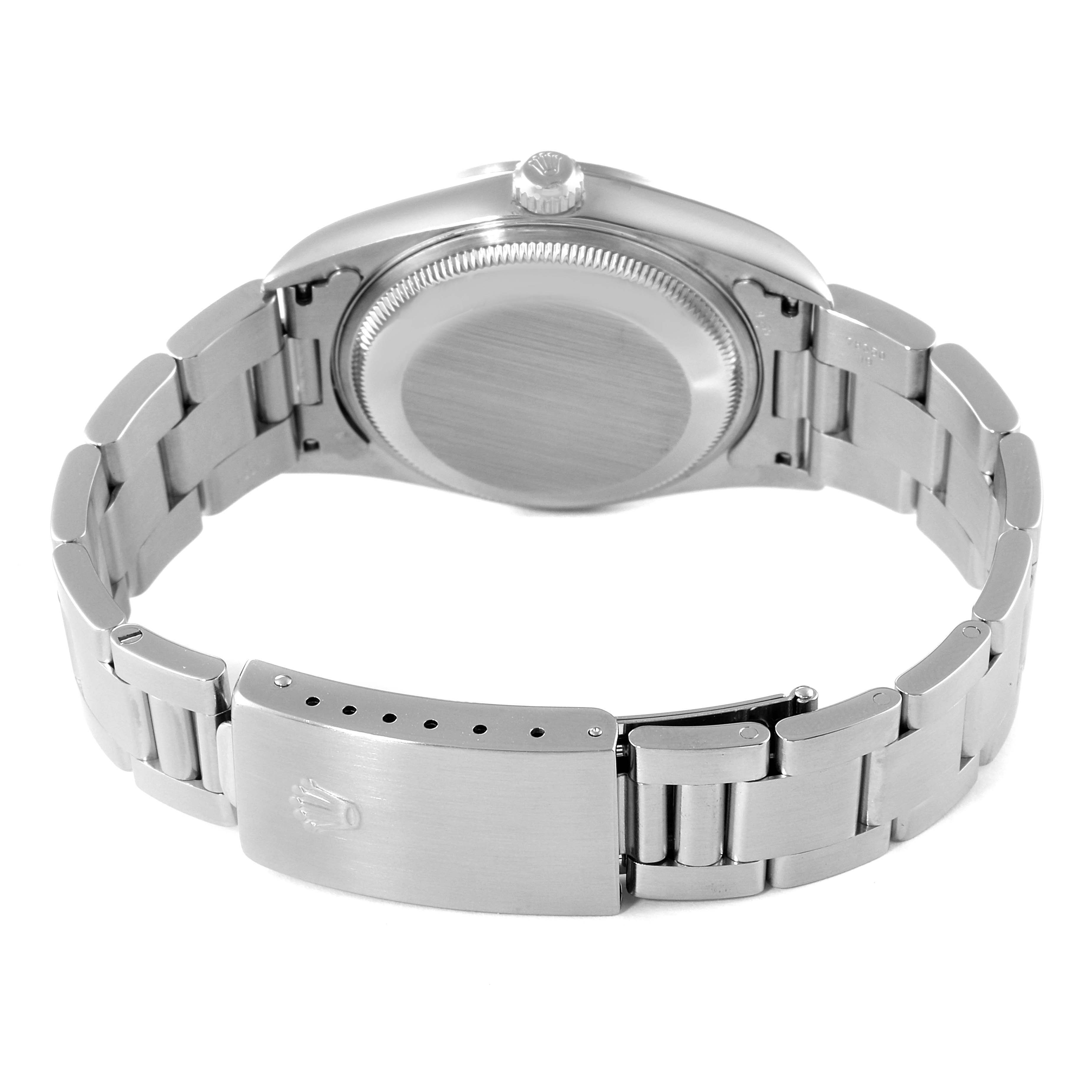 The image shows the back side of the Rolex Date 15200 Men's Stainless Steel Black Dial 15200 Men's Stainless Steel Black Dial model watch, including the case back, crown, and metal bracelet with the clasp.