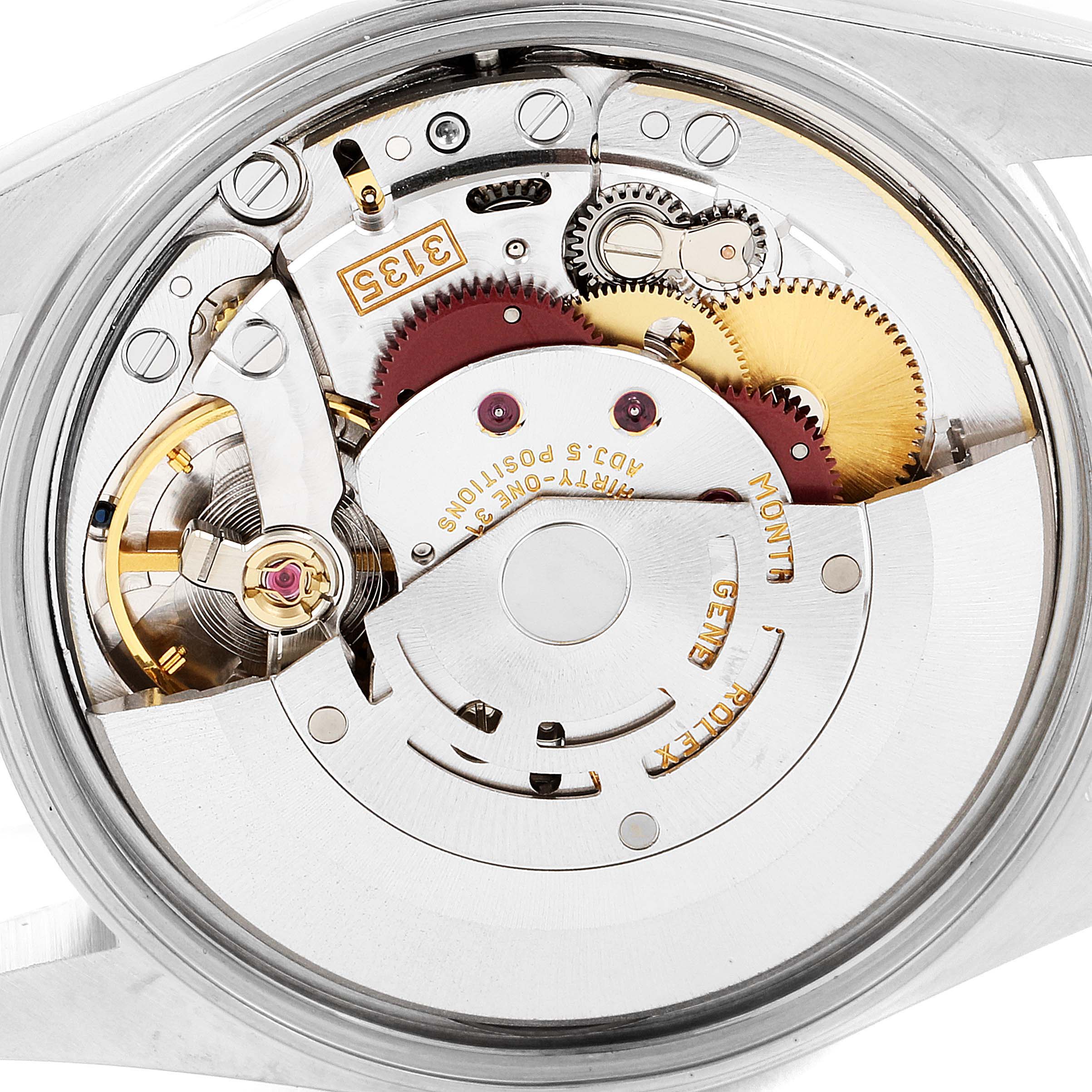 This image shows a close-up of the internal mechanism of a Rolex Date 15200 Men's Stainless Steel Silver Dial 15200 Men's Stainless Steel Silver Dial model watch, highlighting gears and movement components.