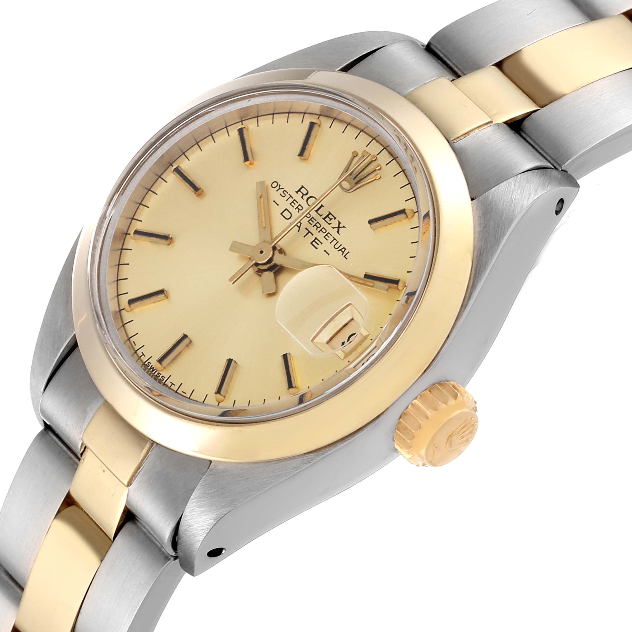 This image shows a close-up angled view of the face, bezel, crown, and part of the bracelet of a Rolex Date 6916 Women's Steel and Gold (two tone) Champagne Dial 6916 Women's Steel and Gold (two tone) Champagne Dial model watch.