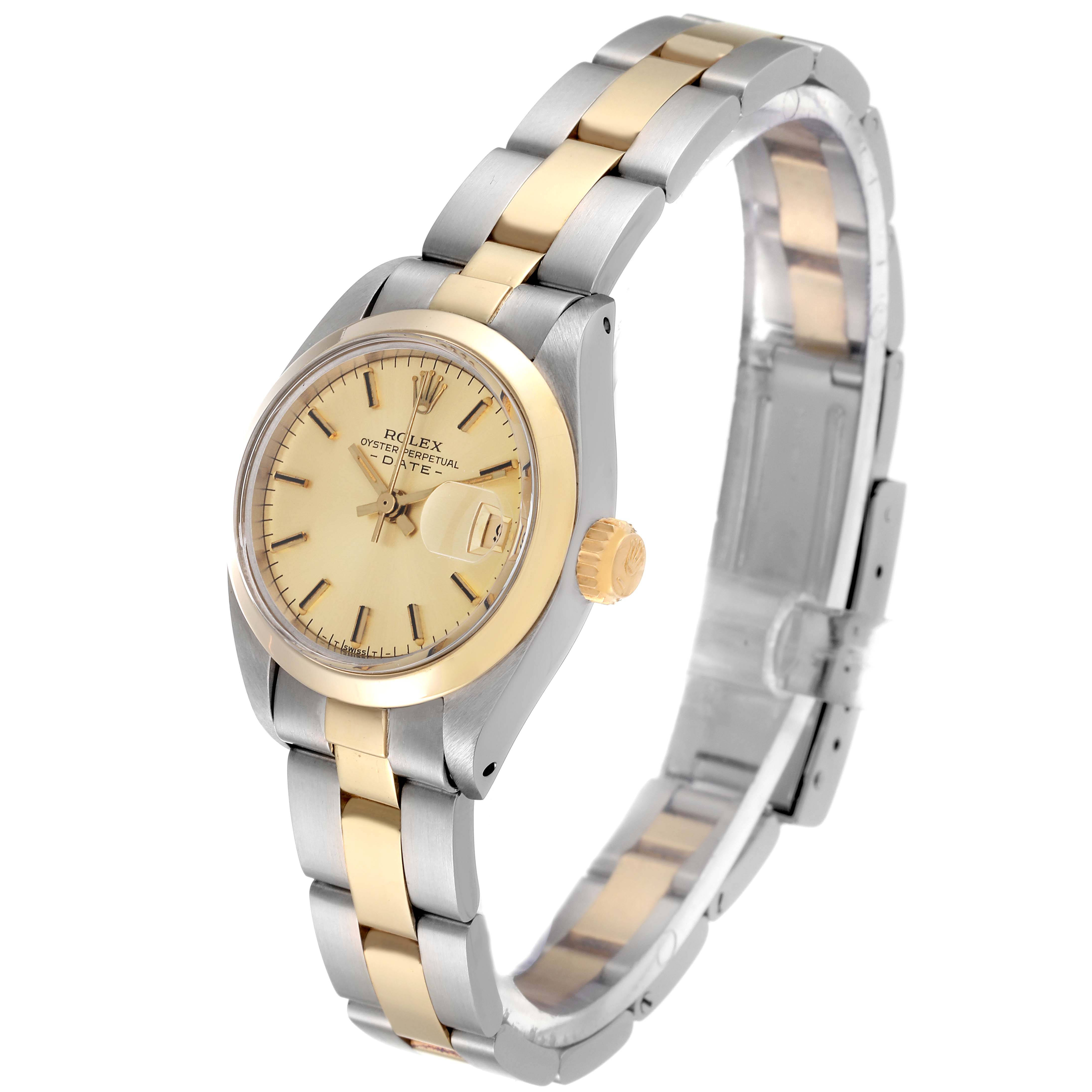 This image shows a Rolex Date 6916 Women's Steel and Gold (two tone) Champagne Dial 6916 Women's Steel and Gold (two tone) Champagne Dial watch at a three-quarter angle featuring the dial, bezel, lugs, crown, and bracelet.