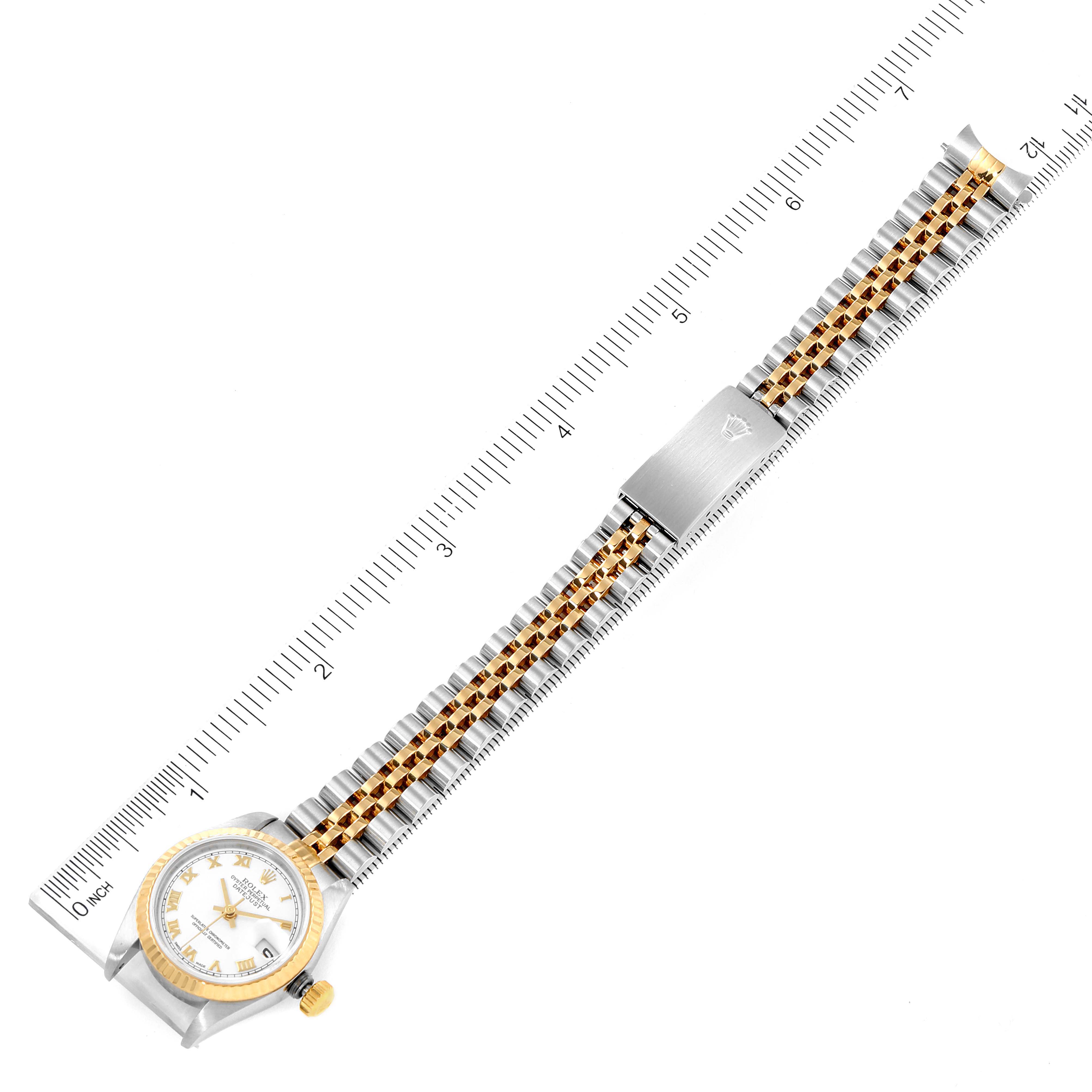 The image shows a top-down view of a Rolex Datejust 79173 Women's Steel and Gold (two tone) White Dial 79173 Women's Steel and Gold (two tone) White Dial watch, highlighting the face, bracelet, and clasp, with measurements alongside.