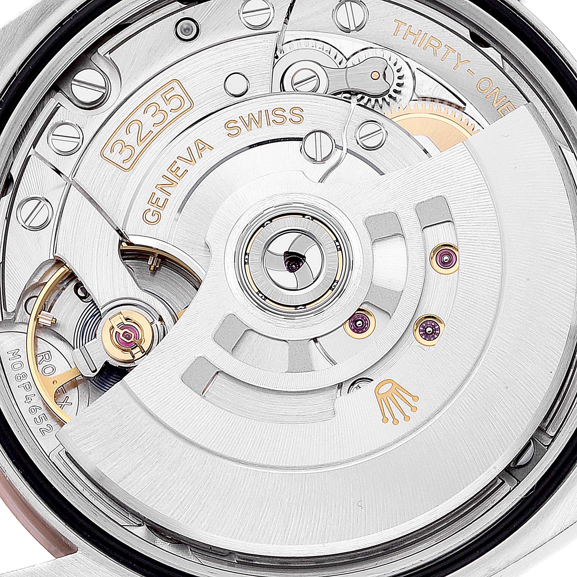The image shows a close-up view of the movement mechanism of a Rolex Datejust 126231 Men's Steel and Gold (two tone) Grey Dial 126231 Men's Steel and Gold (two tone) Grey Dial watch.