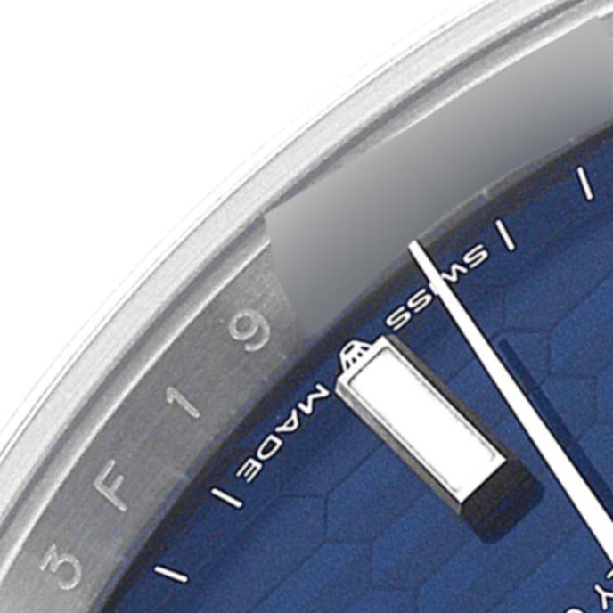 This image shows a close-up of the dial and hour markers of the Datejust 41 model by Rolex.