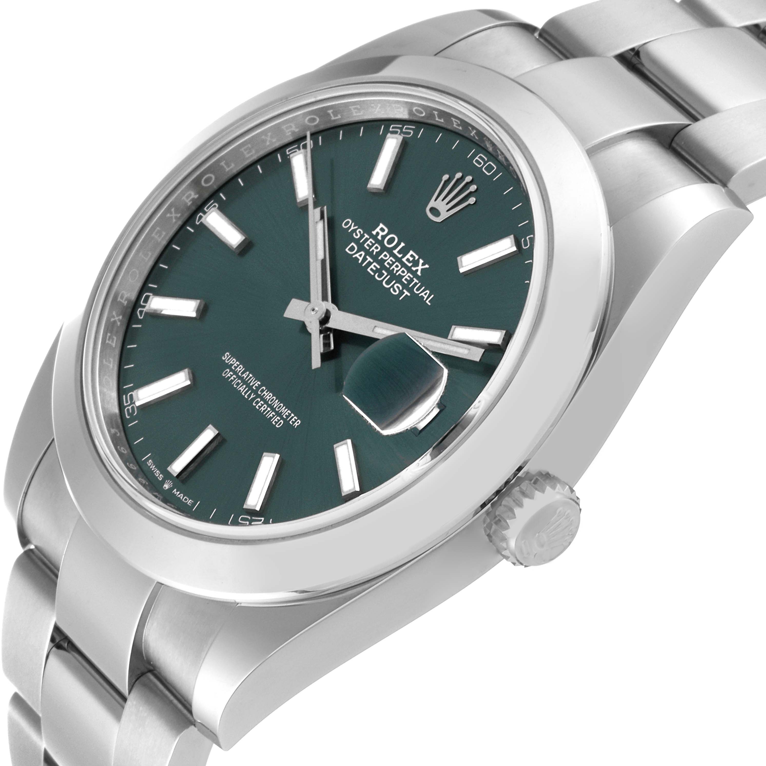 The image shows a Rolex Datejust 41 126300 Men
s Stainless Steel Green Dial 126300 Men
s Stainless Steel Green Dial watch from a slightly tilted side angle, displaying the face, bezel, crown, and part of the bracelet.