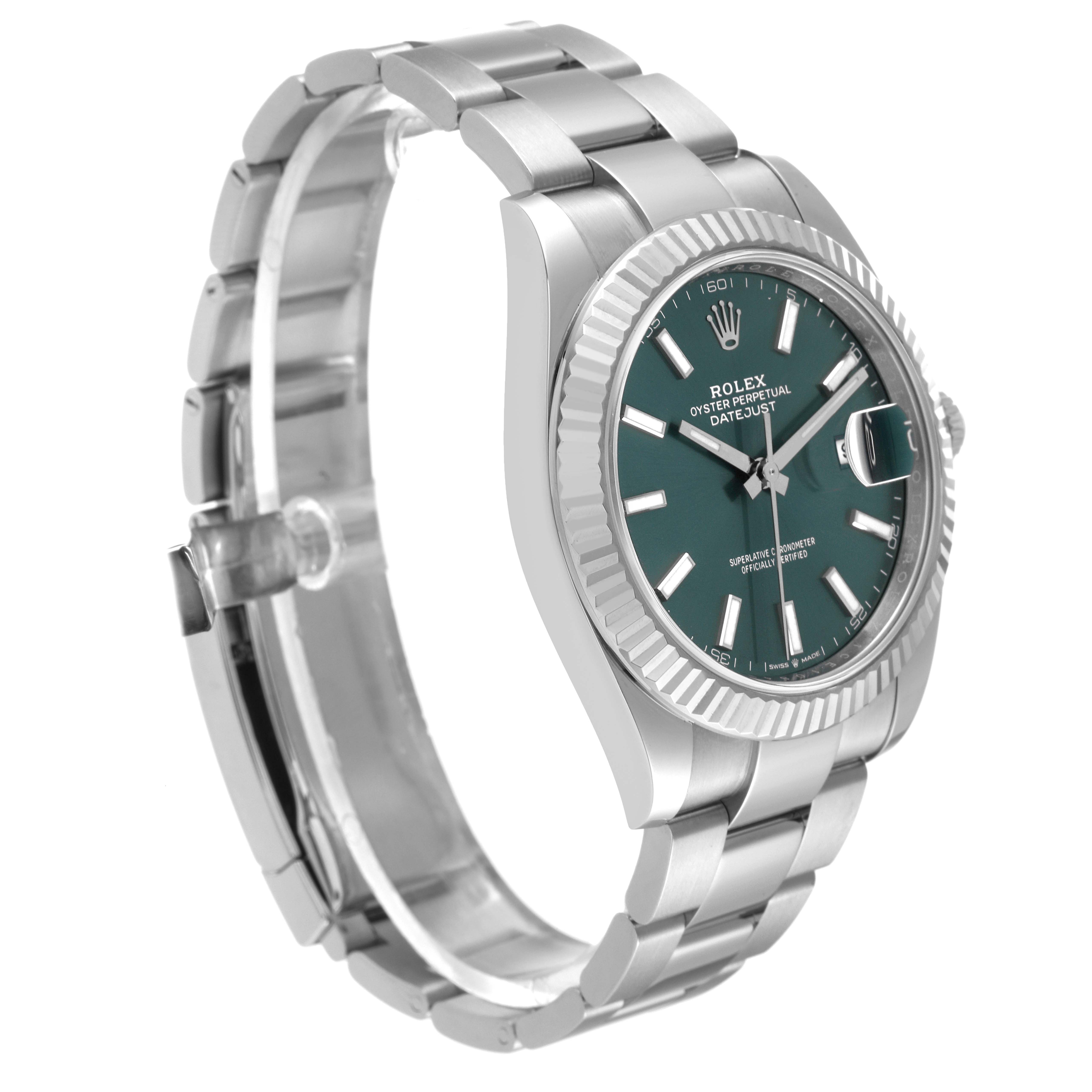 The image shows the Rolex Datejust 41 126334 Men
s Stainless Steel Green Dial 126334 Men
s Stainless Steel Green Dial from a side-angle, highlighting its silver bracelet, bezel, and green dial.