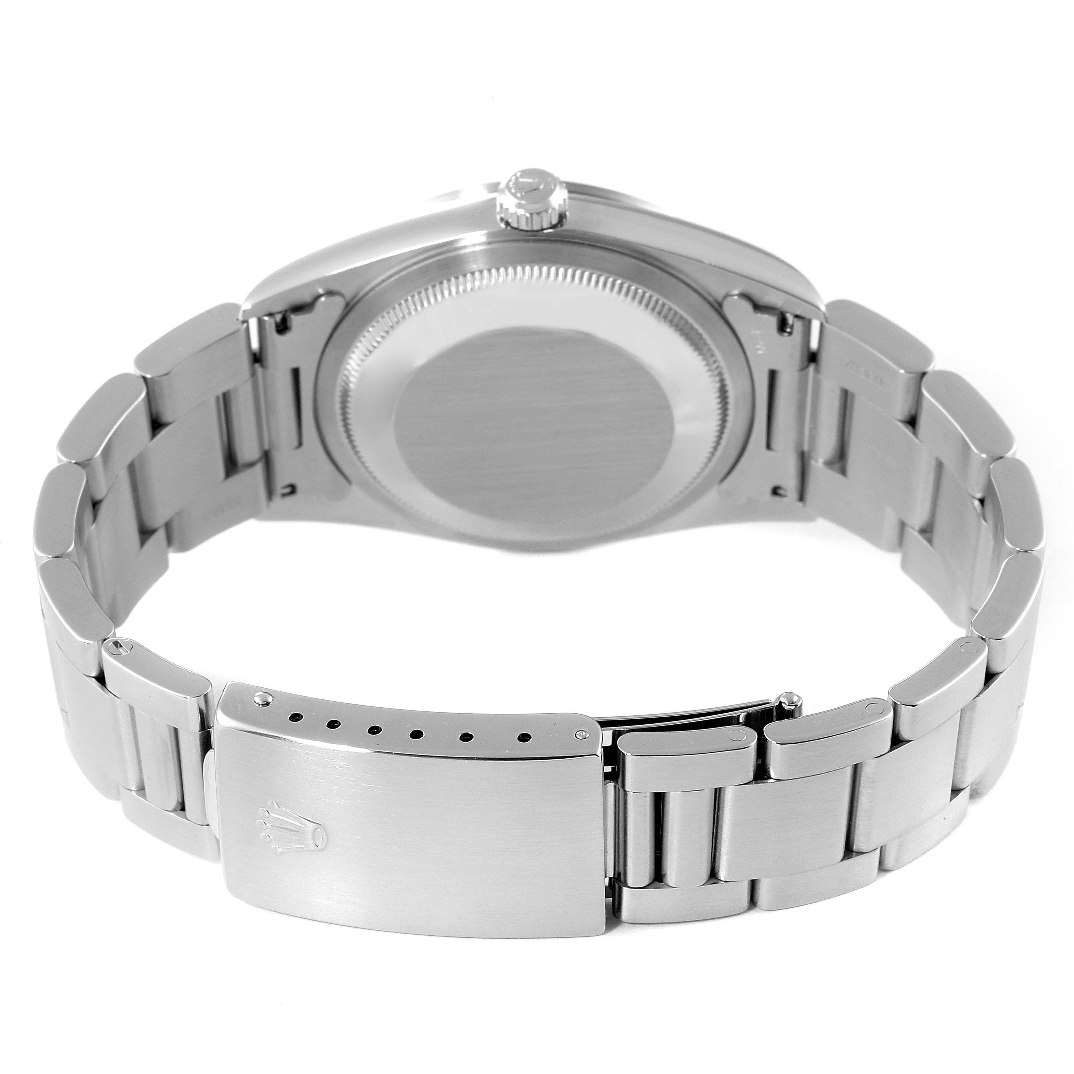 The image shows the back case, crown, and bracelet clasp of a Rolex Datejust 16200 Men
s Stainless Steel Black Dial 16200 Men
s Stainless Steel Black Dial watch from a rear angle.